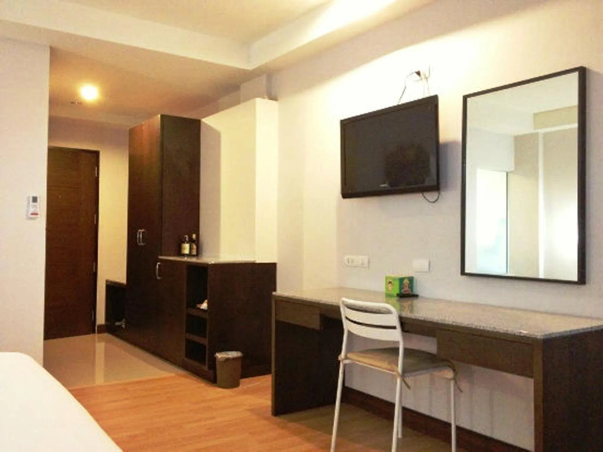 Living room, Bed in SinKiat Buri Hotel