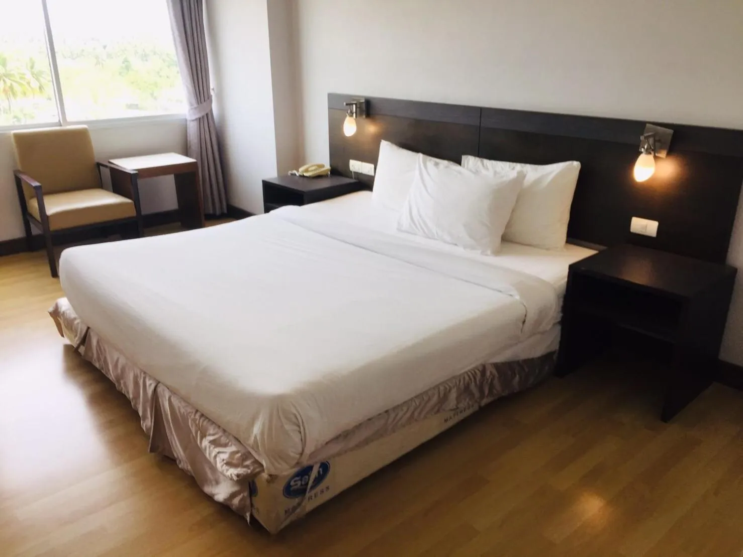 Bed in SinKiat Buri Hotel