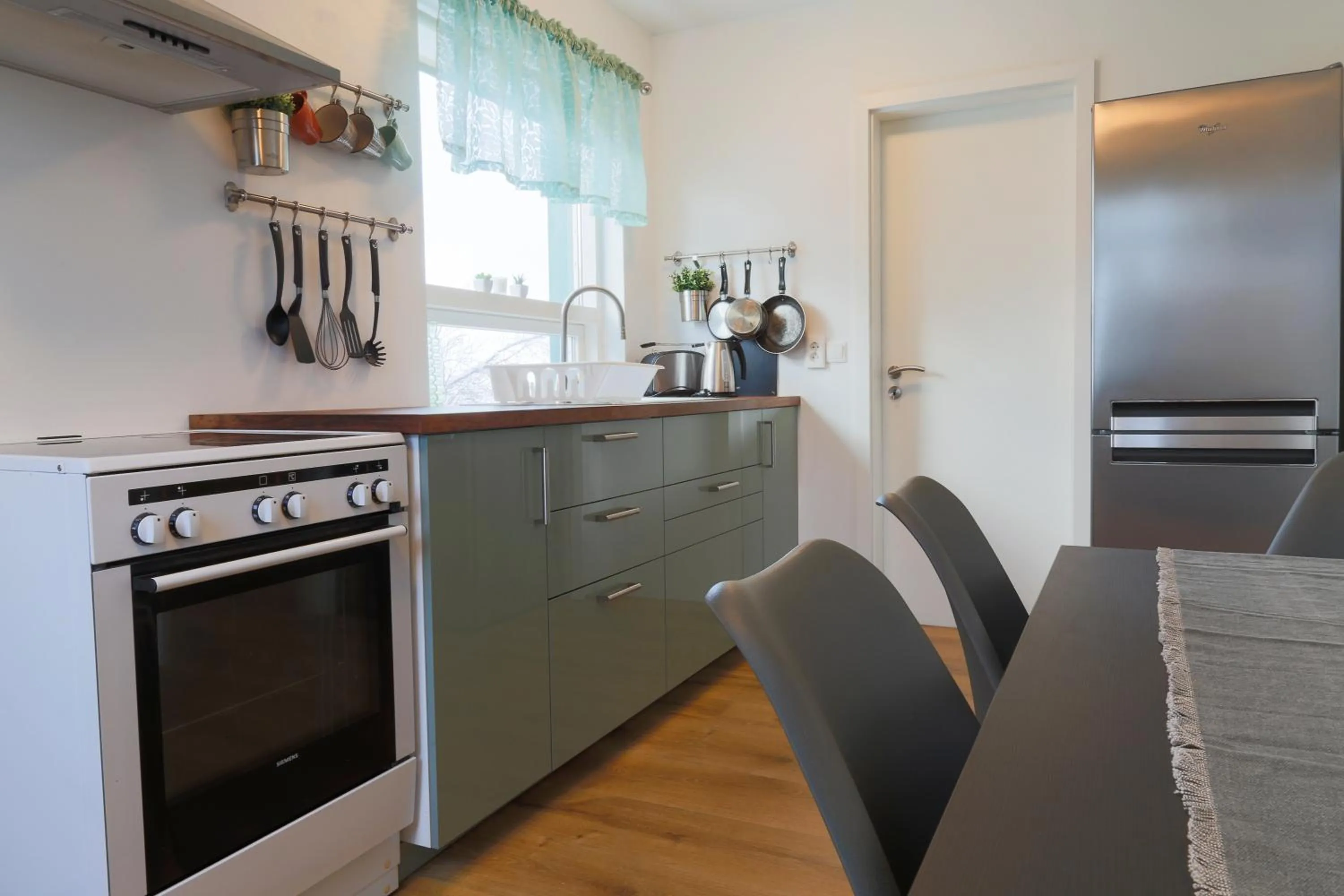 Kitchen or kitchenette in The apartment - Öbbuhús