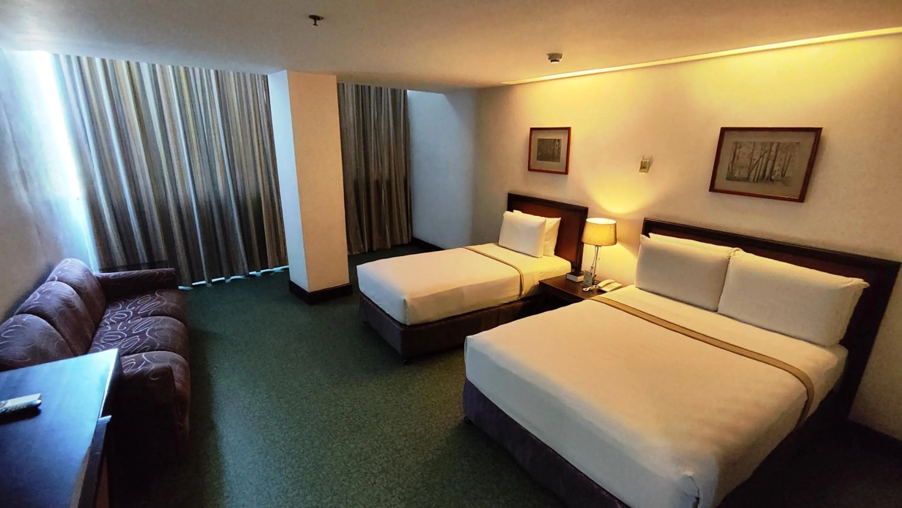 Bed in Rajah Park Hotel by Hiverooms