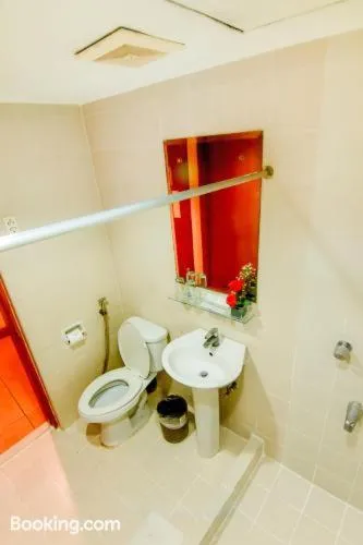 Bathroom in Rajah Park Hotel by Hiverooms