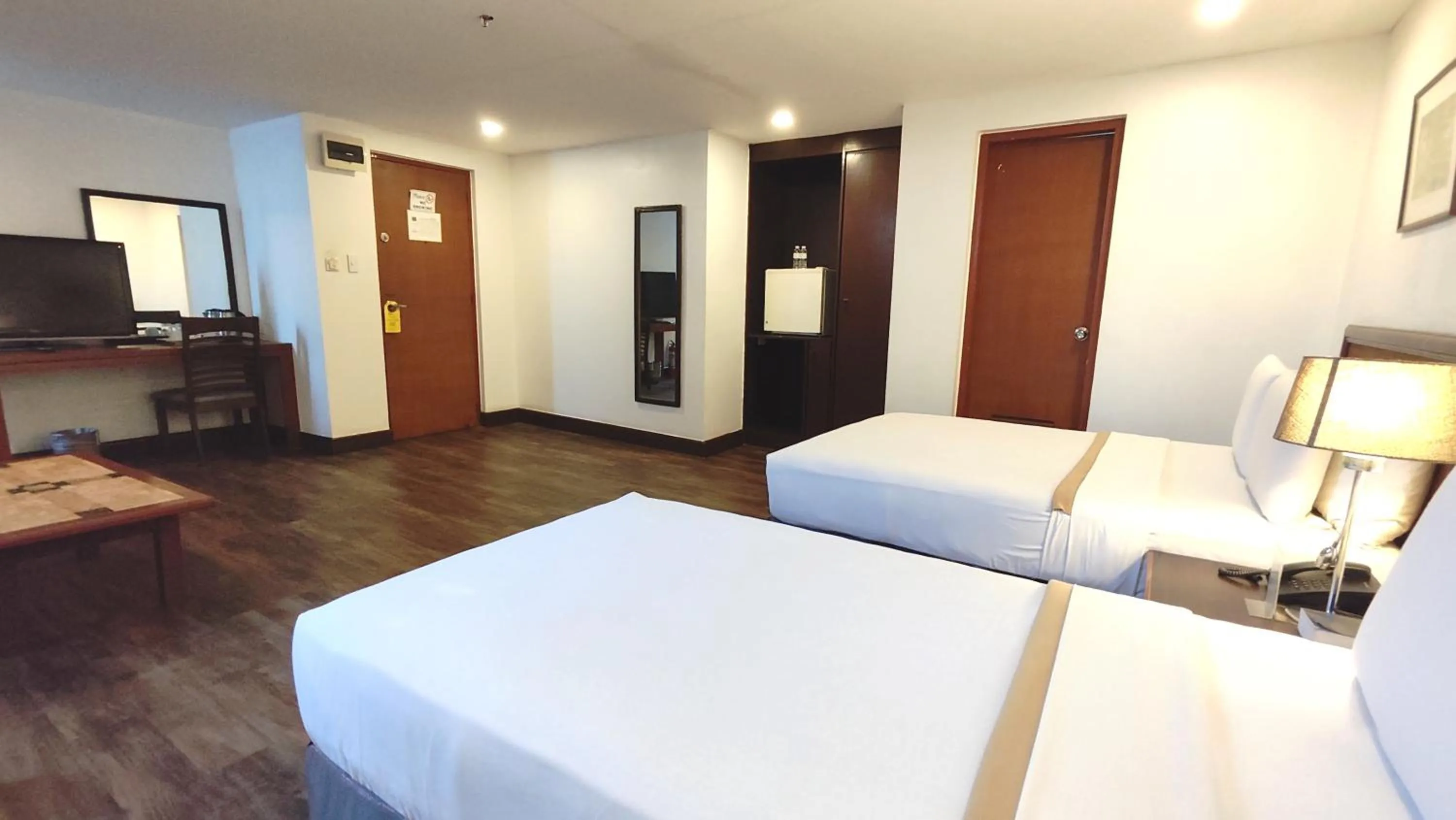 Bed in Rajah Park Hotel by Hiverooms