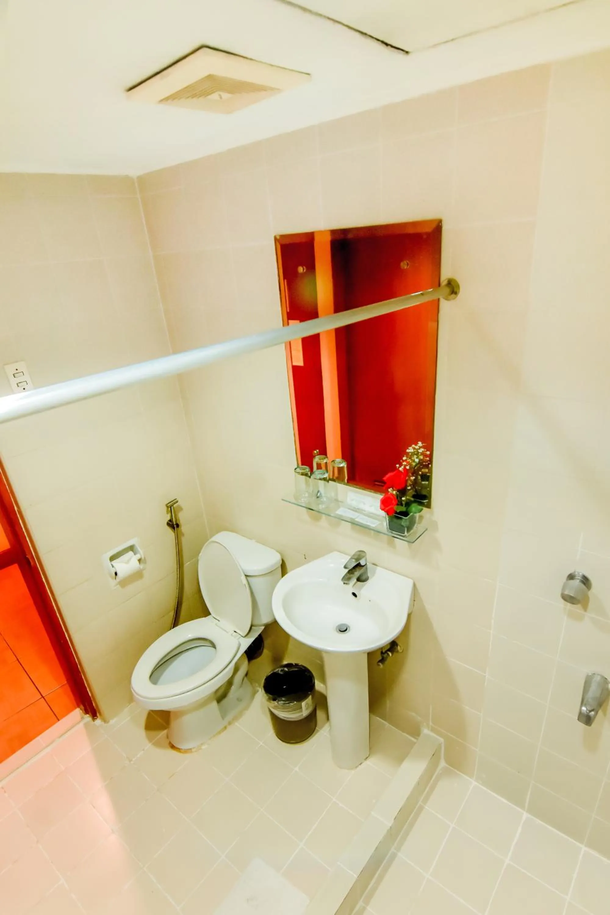 Bathroom in Rajah Park Hotel by Hiverooms