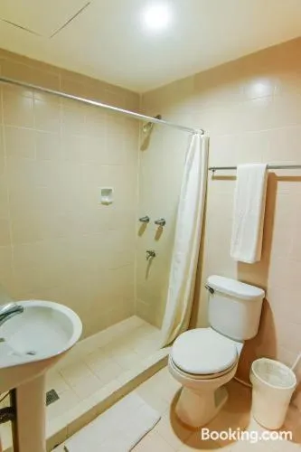 Bathroom in Rajah Park Hotel by Hiverooms