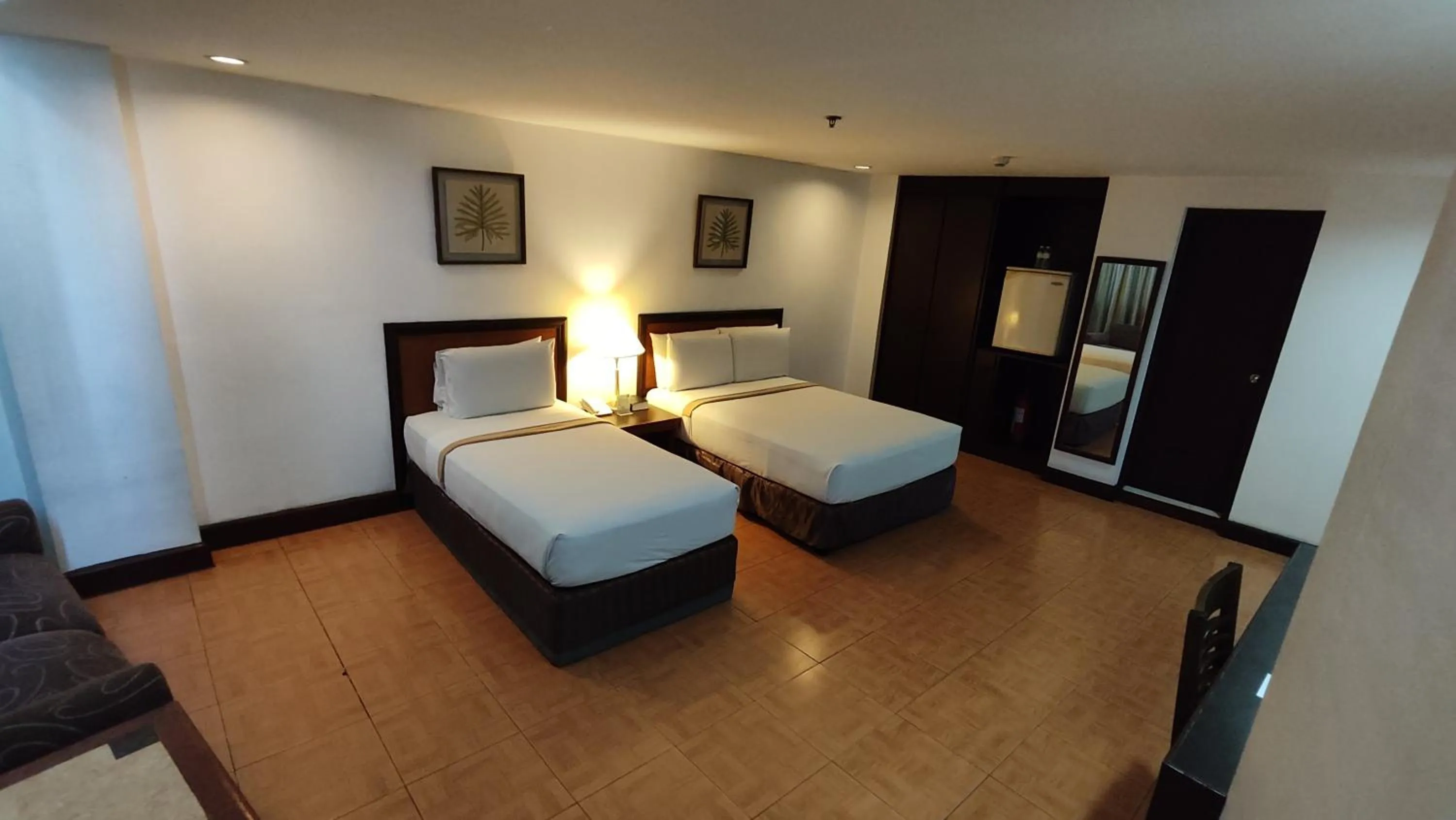 Bed in Rajah Park Hotel by Hiverooms