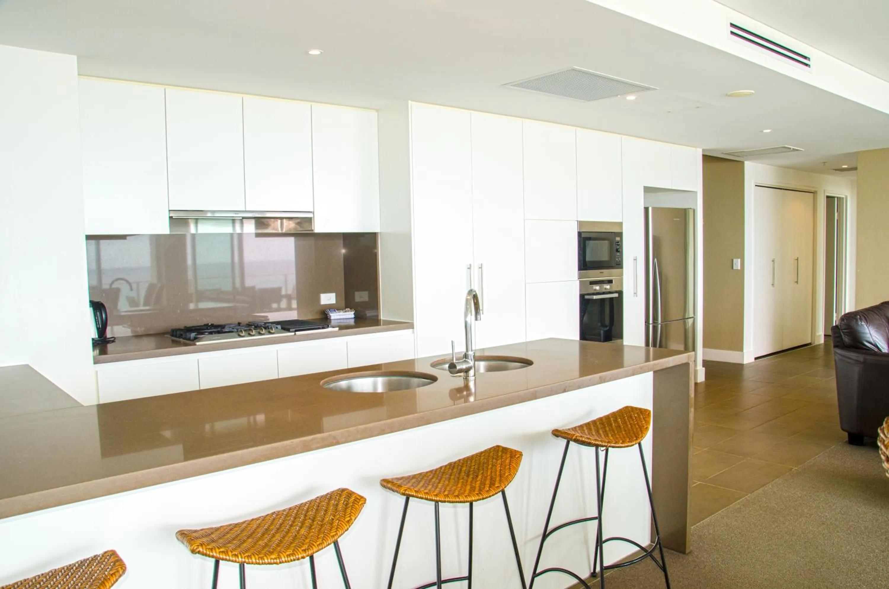 Kitchen or kitchenette in Kirra Surf Apartments