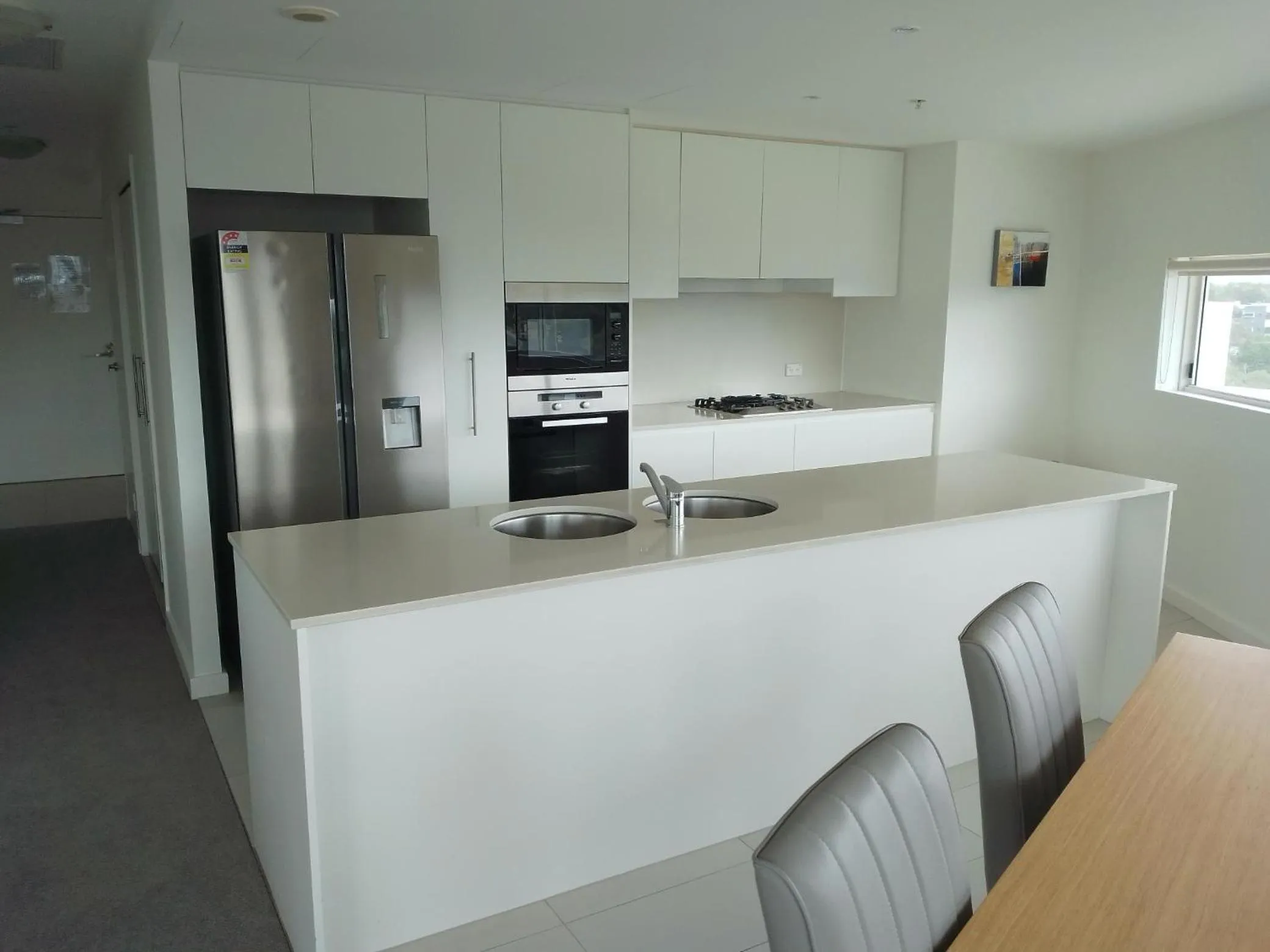 Kitchen or kitchenette in Kirra Surf Apartments