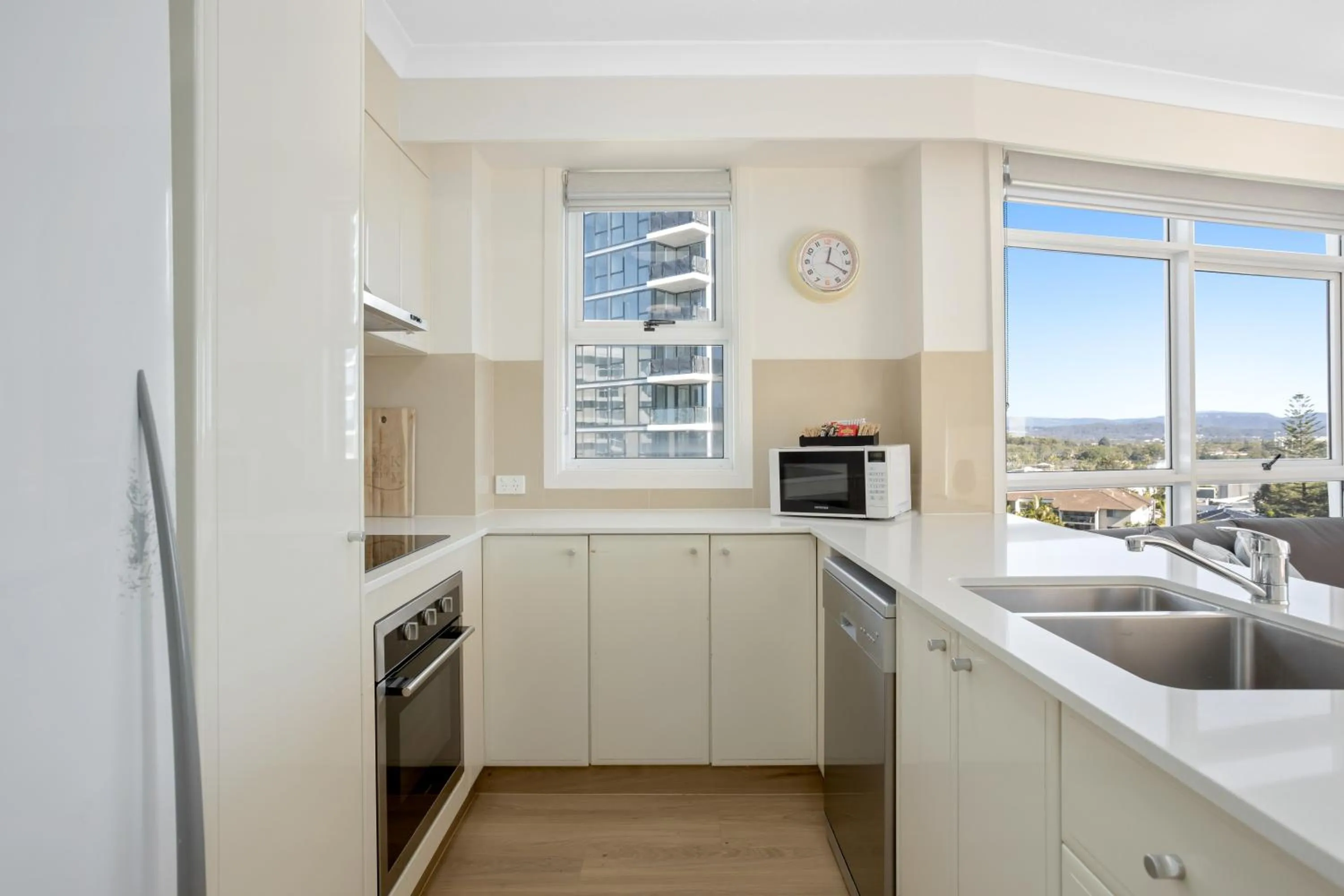 Kitchen or kitchenette in ULTIQA Burleigh Mediterranean Resort