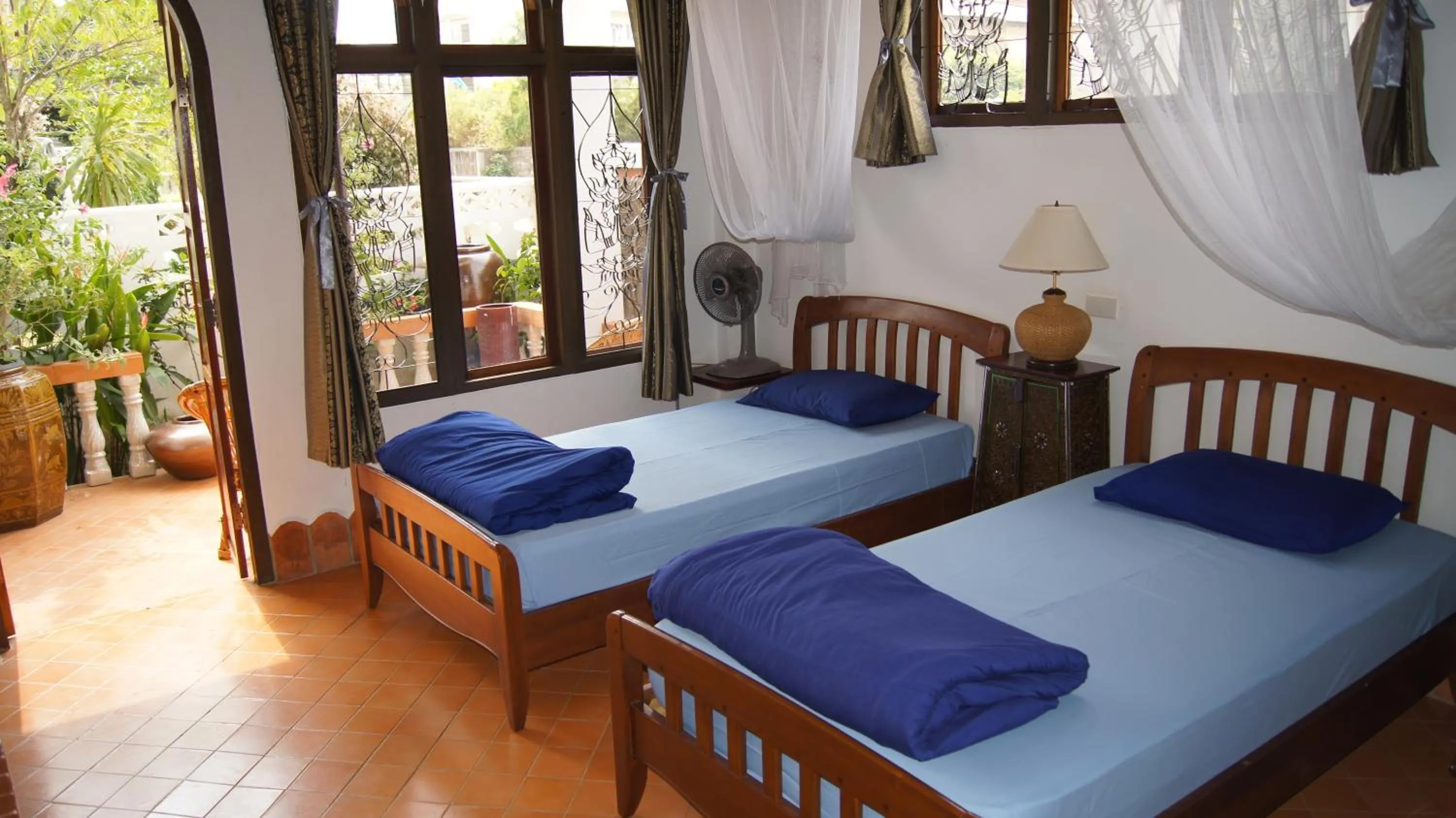 Photo of the whole room, Bed in Mut Mee Garden Guest House