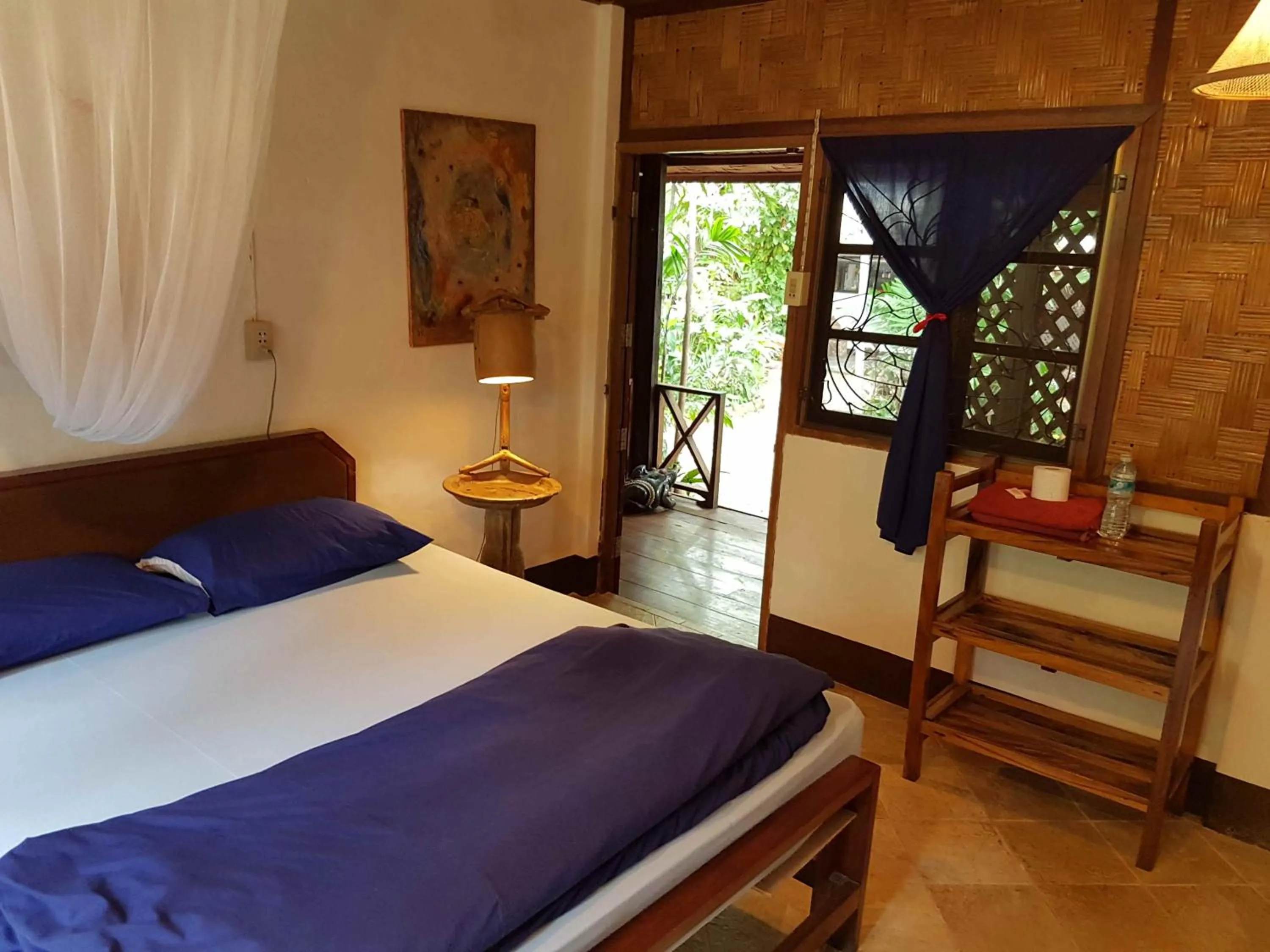 Bed in Mut Mee Garden Guest House