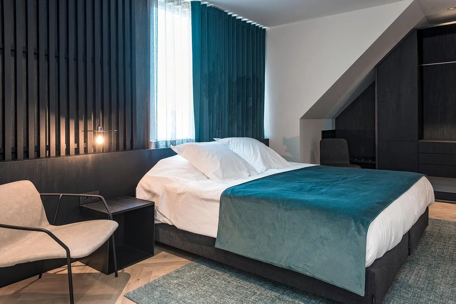 Bed in Designhotel Beila