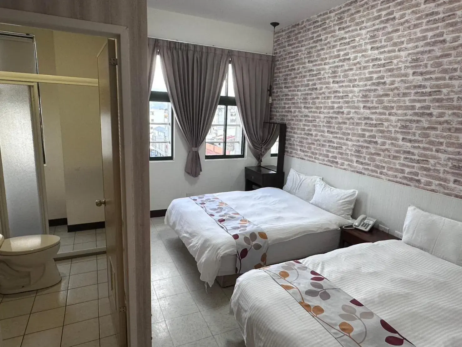 Superior Triple Room in Jia-Jia Business Hotel Superior Triple Room in Jia-Jia Business Hotel