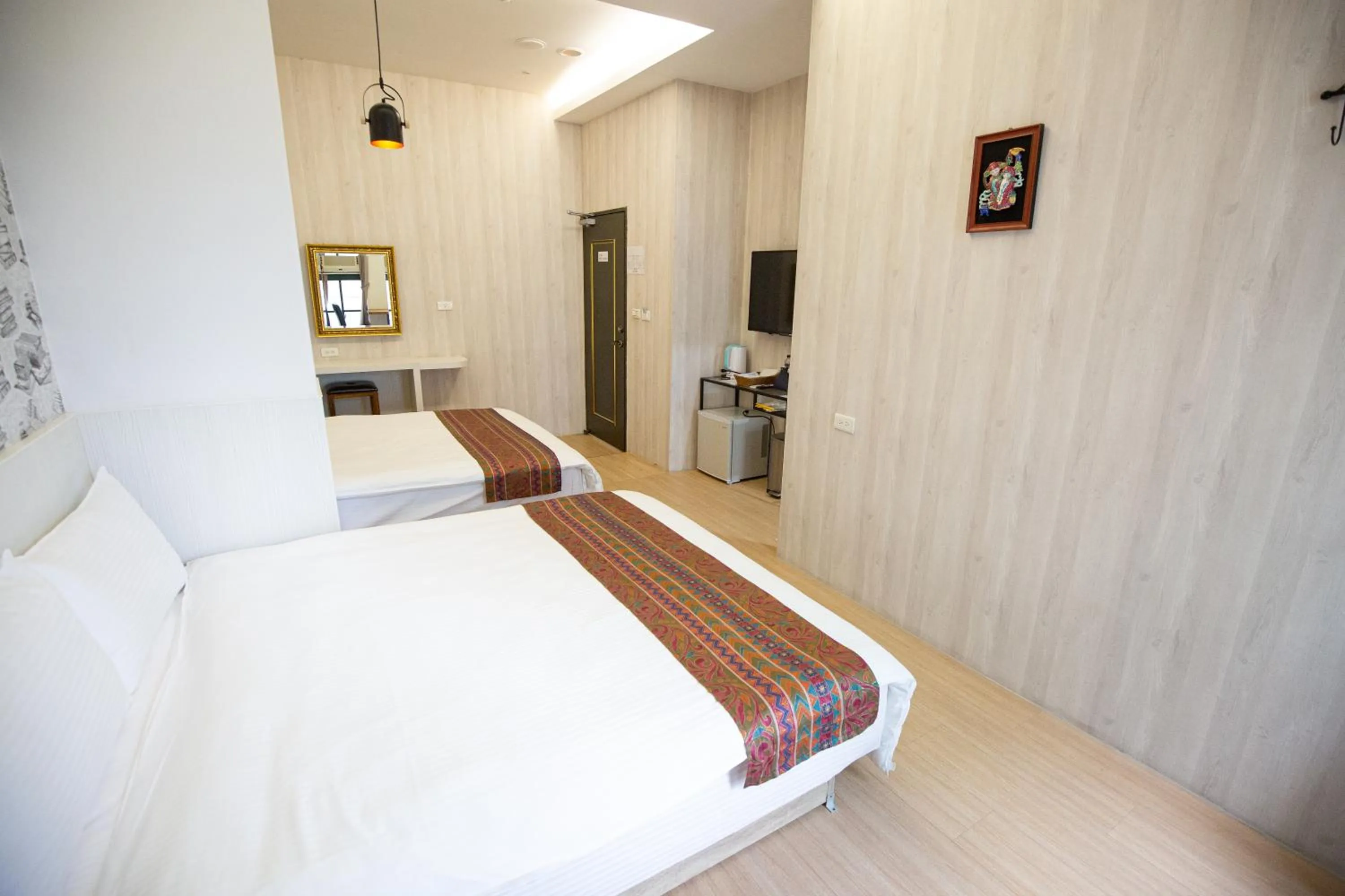 Bed in Jia-Jia Business Hotel