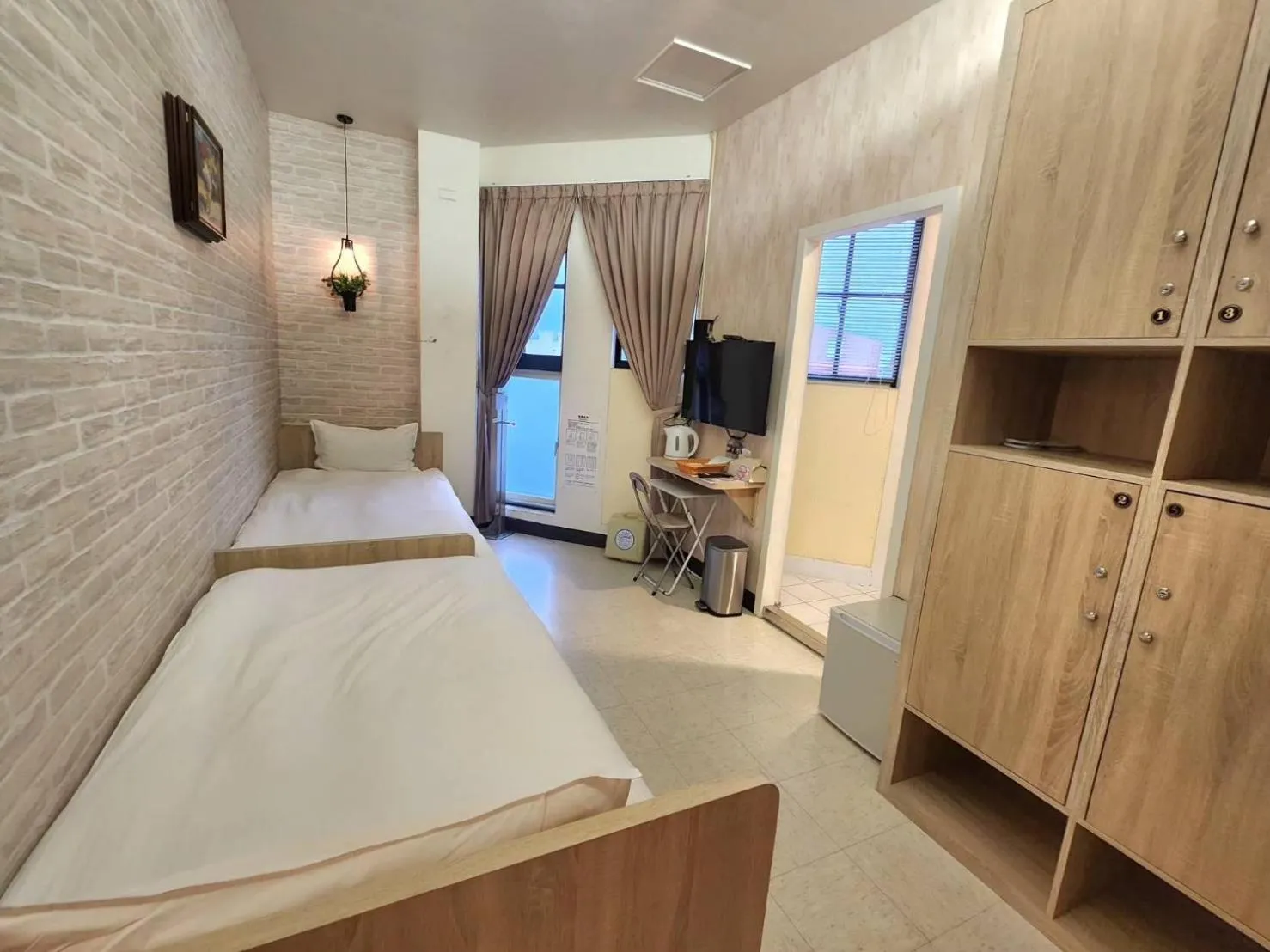 Bed in Jia-Jia Business Hotel