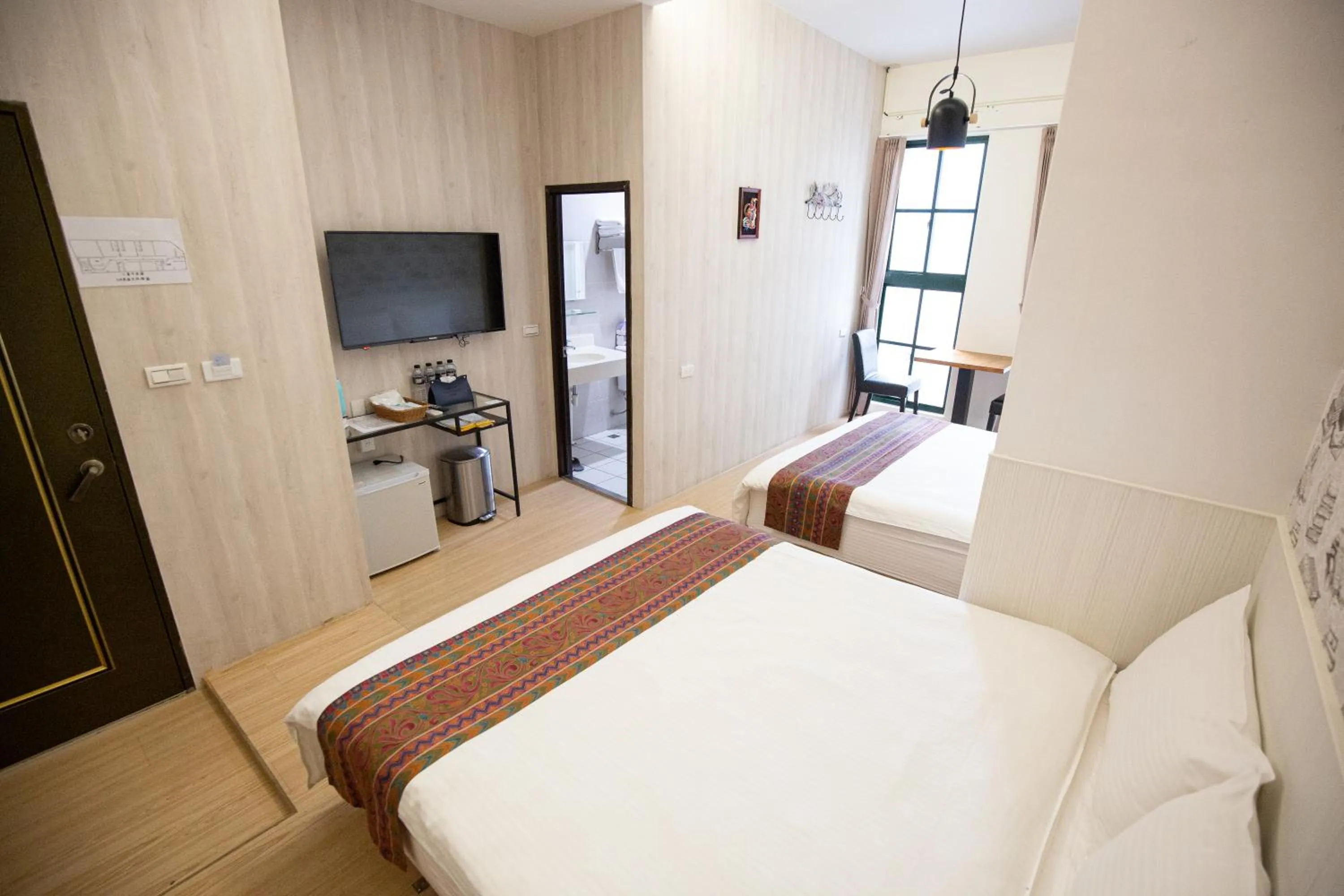 Bed in Jia-Jia Business Hotel