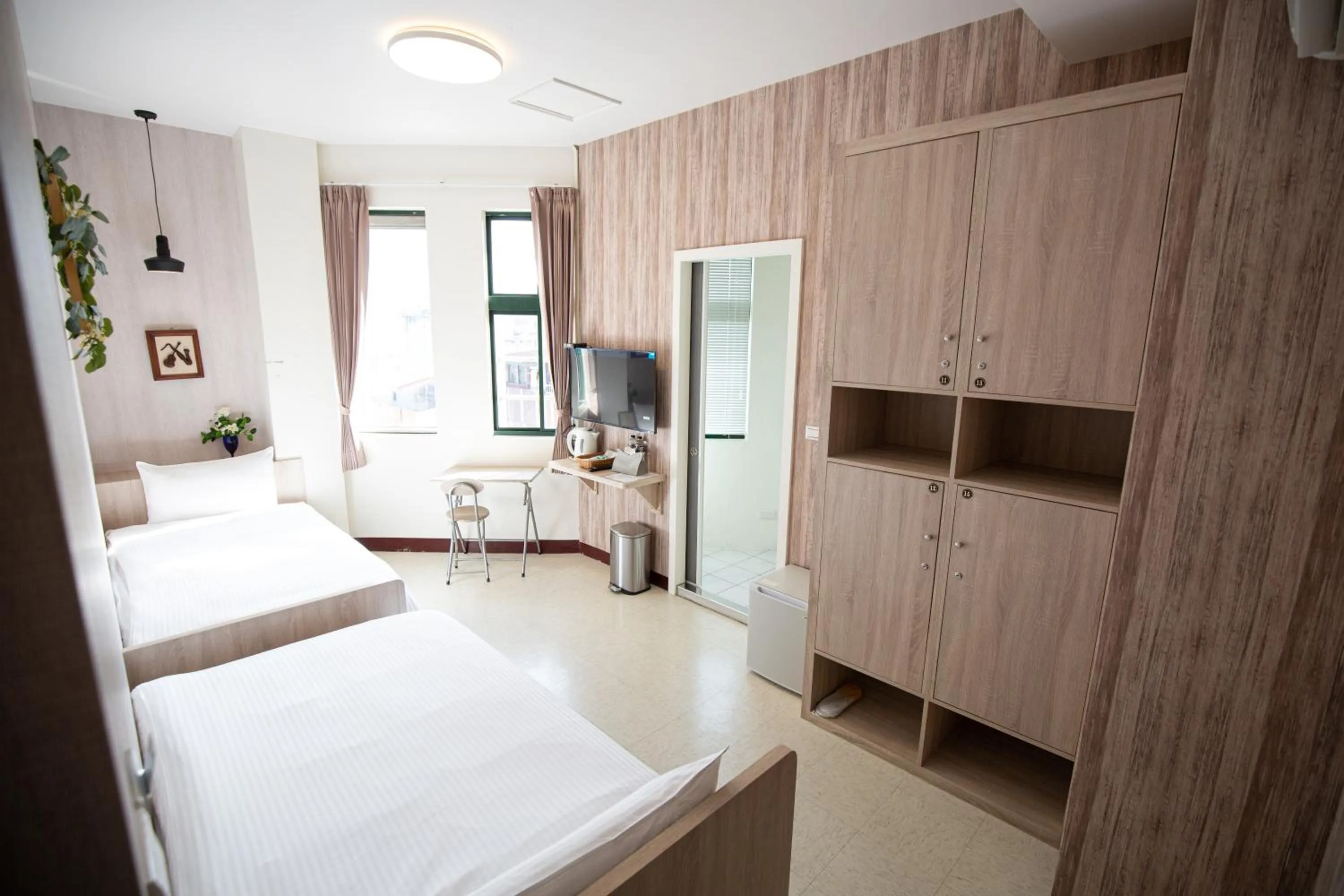 Photo of the whole room, Bed in Jia-Jia Business Hotel