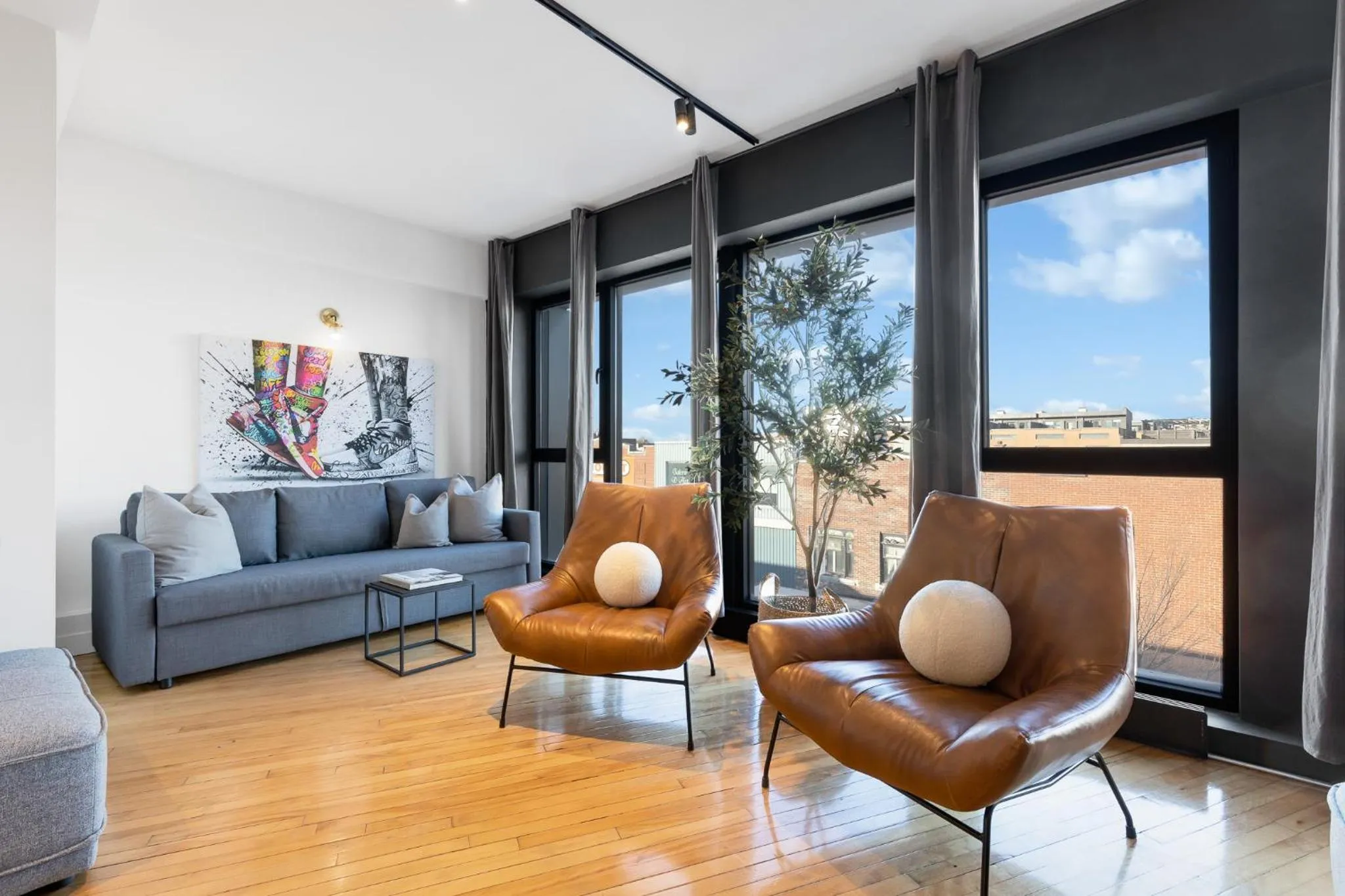 Living room in LiV MTL Plaza