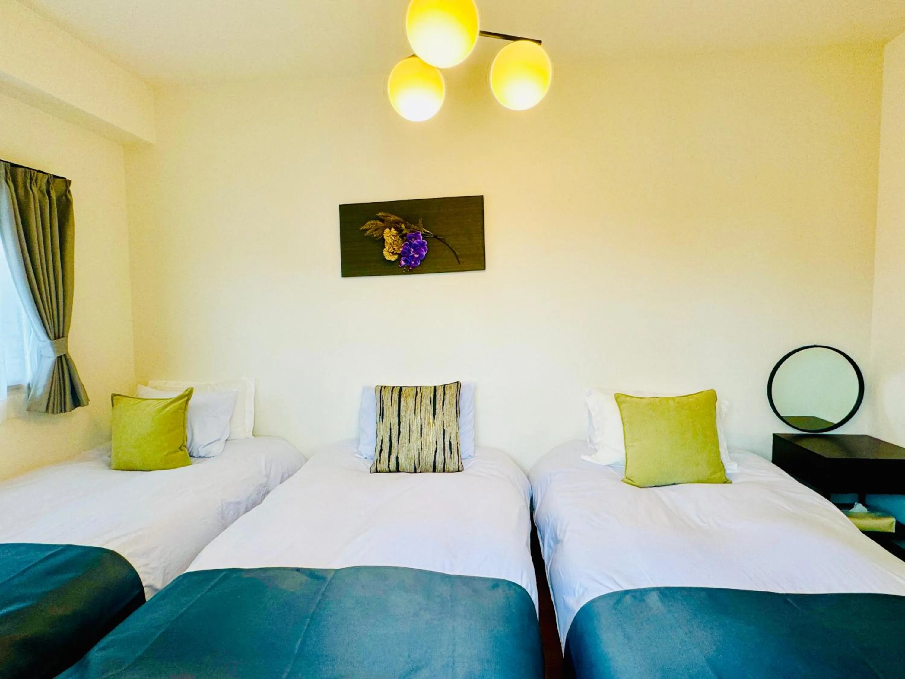 Bed in Crest Daikoku Owner's room -vacation rental-