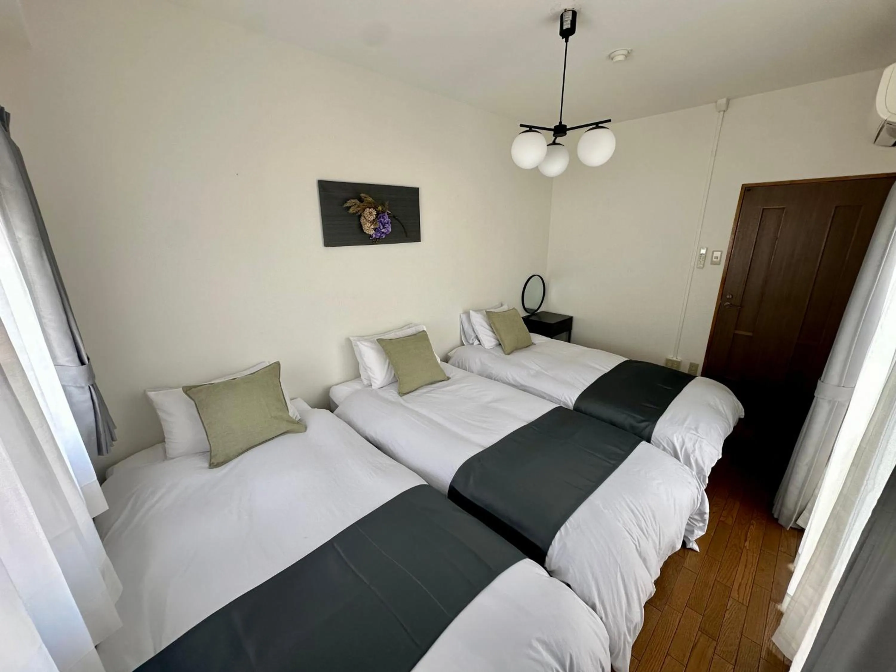 Bed in Crest Daikoku Owner's room -vacation rental-