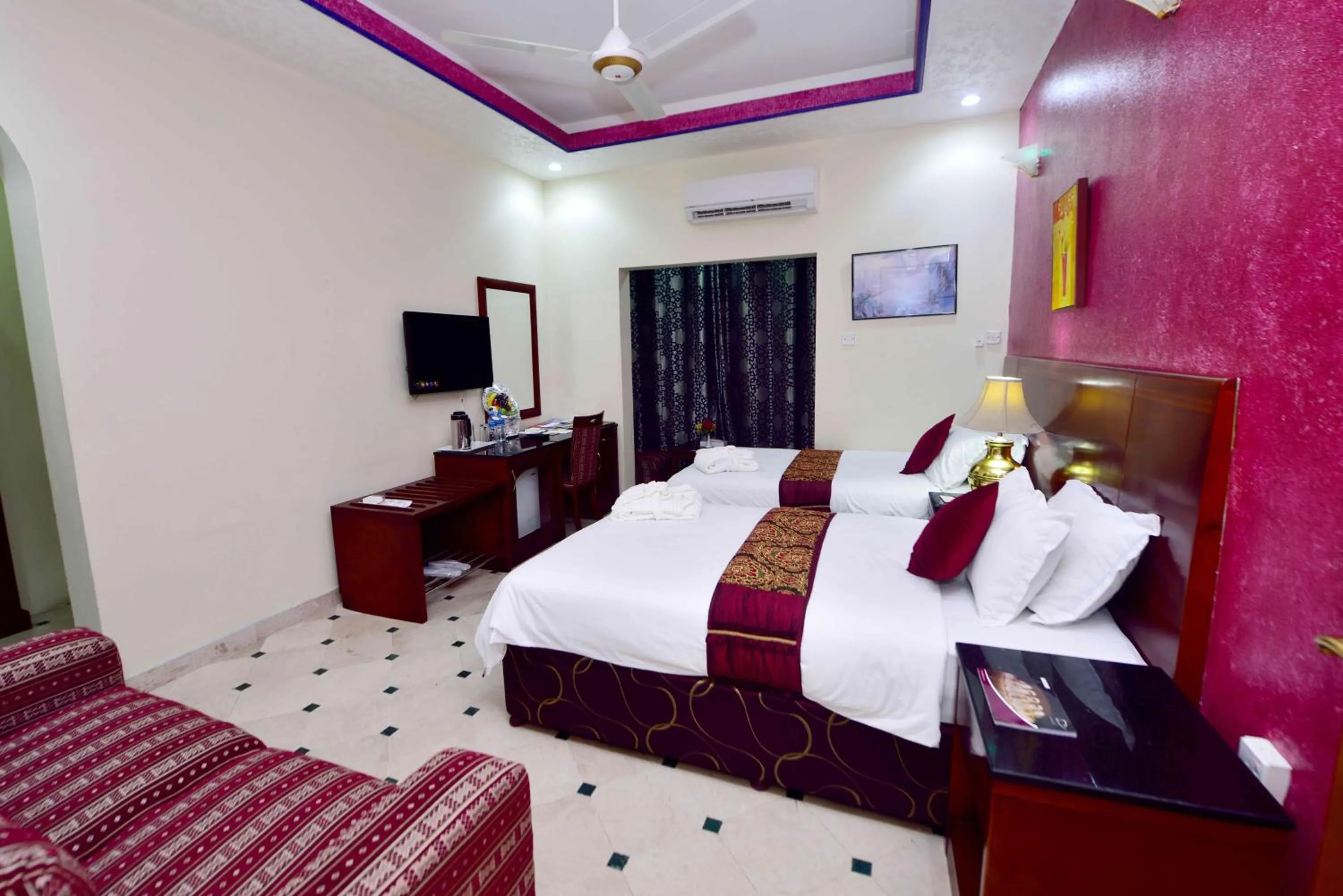 Photo of the whole room, Bed in Al Bahjah Hotel