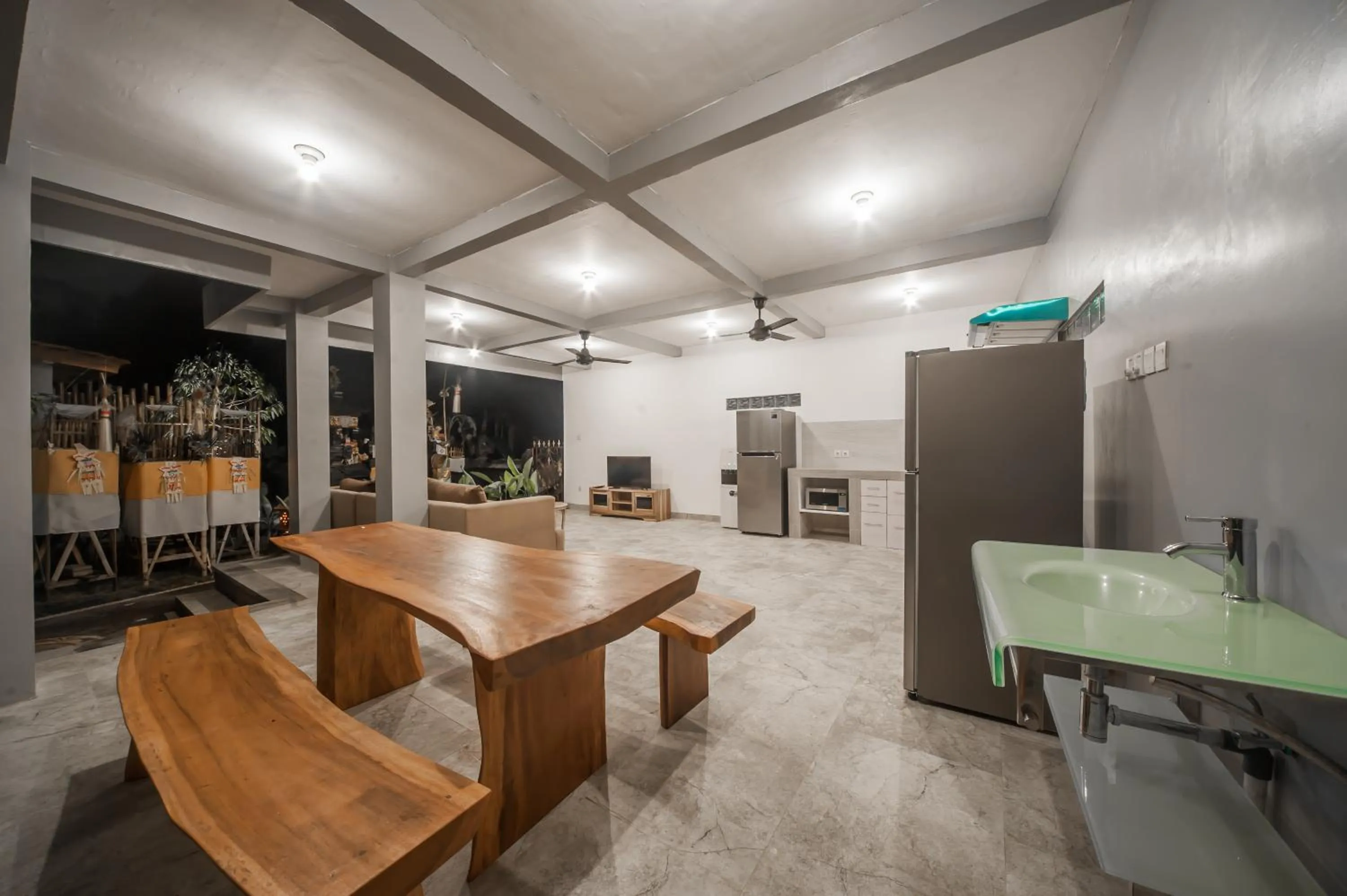 Communal lounge/ TV room in The Lebak Canggu