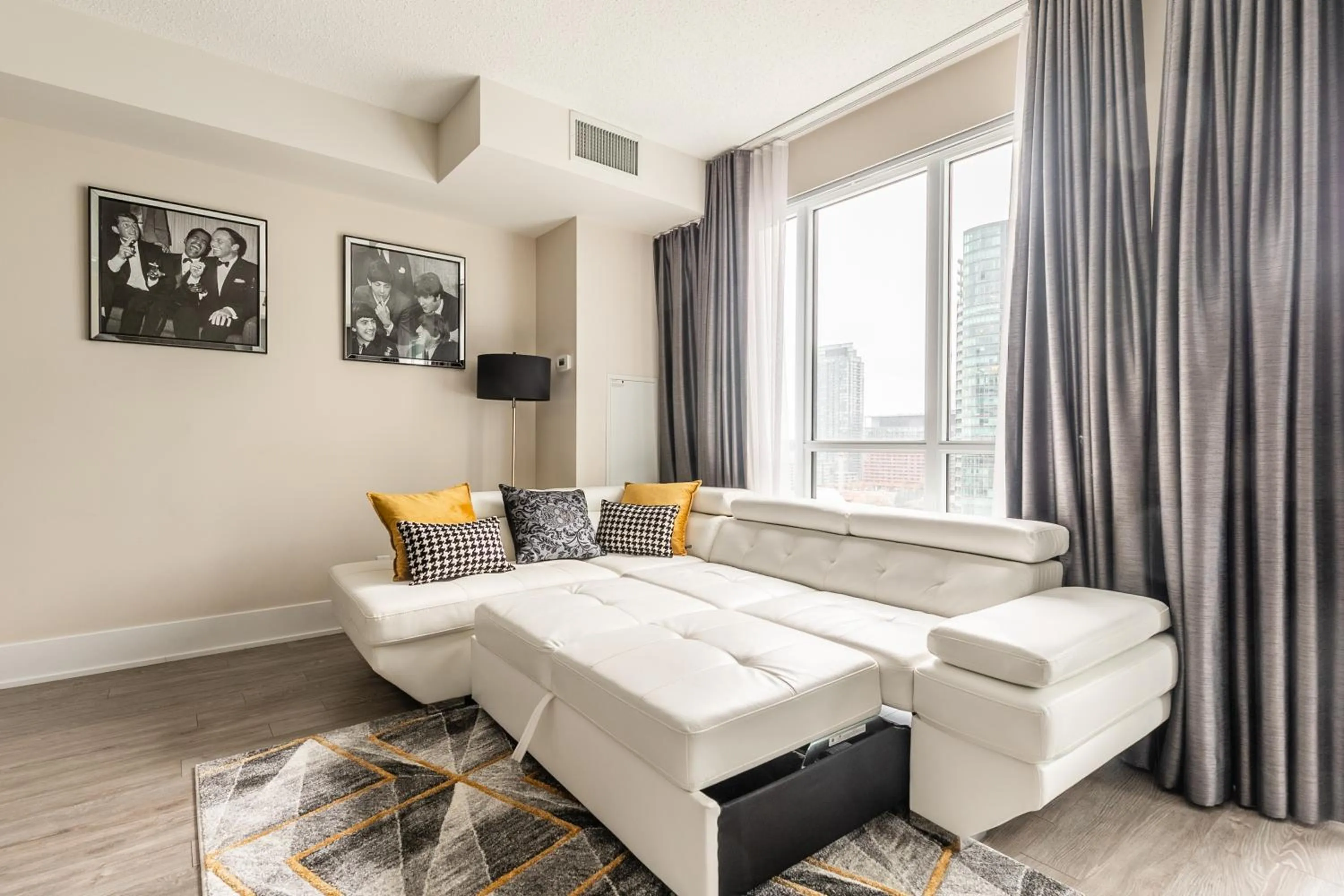 Living room, Bed in GLOBALSTAY Modern Downtown Apartment