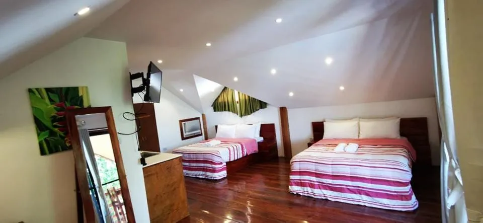 Bed in Descanso En Paraiso Resort