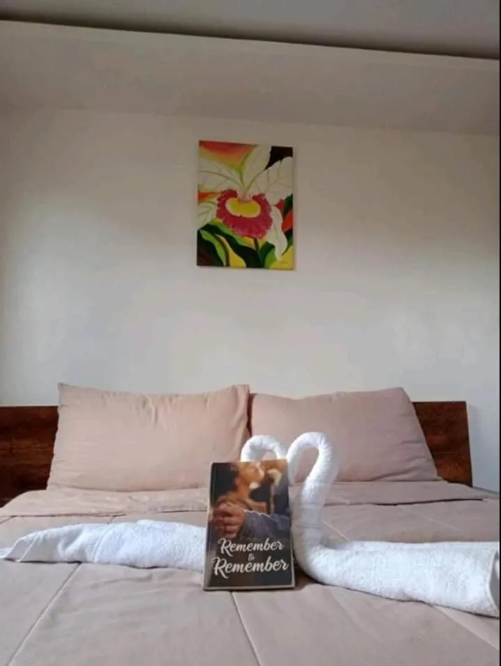 Bed in Descanso En Paraiso Resort