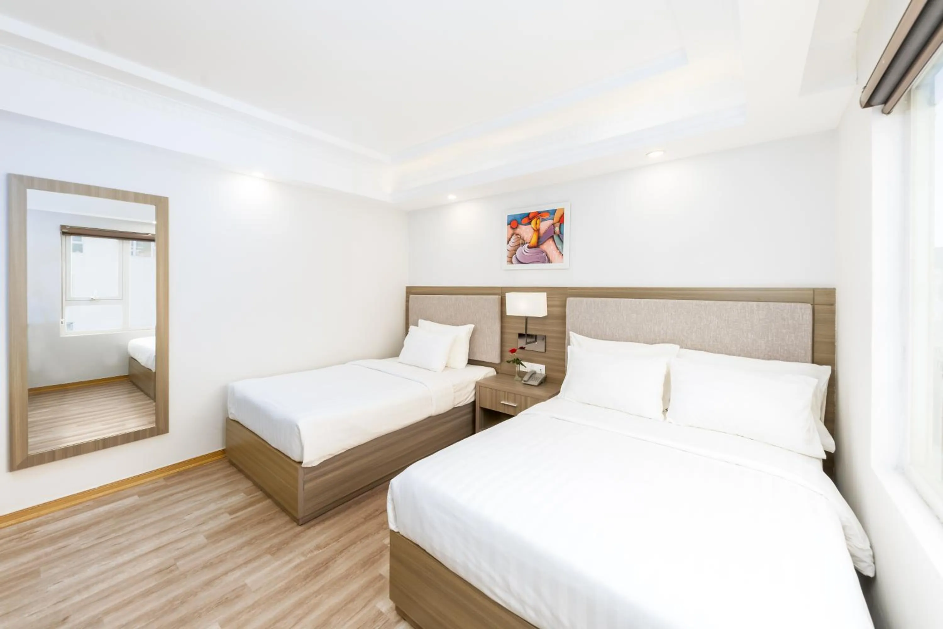 Bed in Golden Rose Hotel