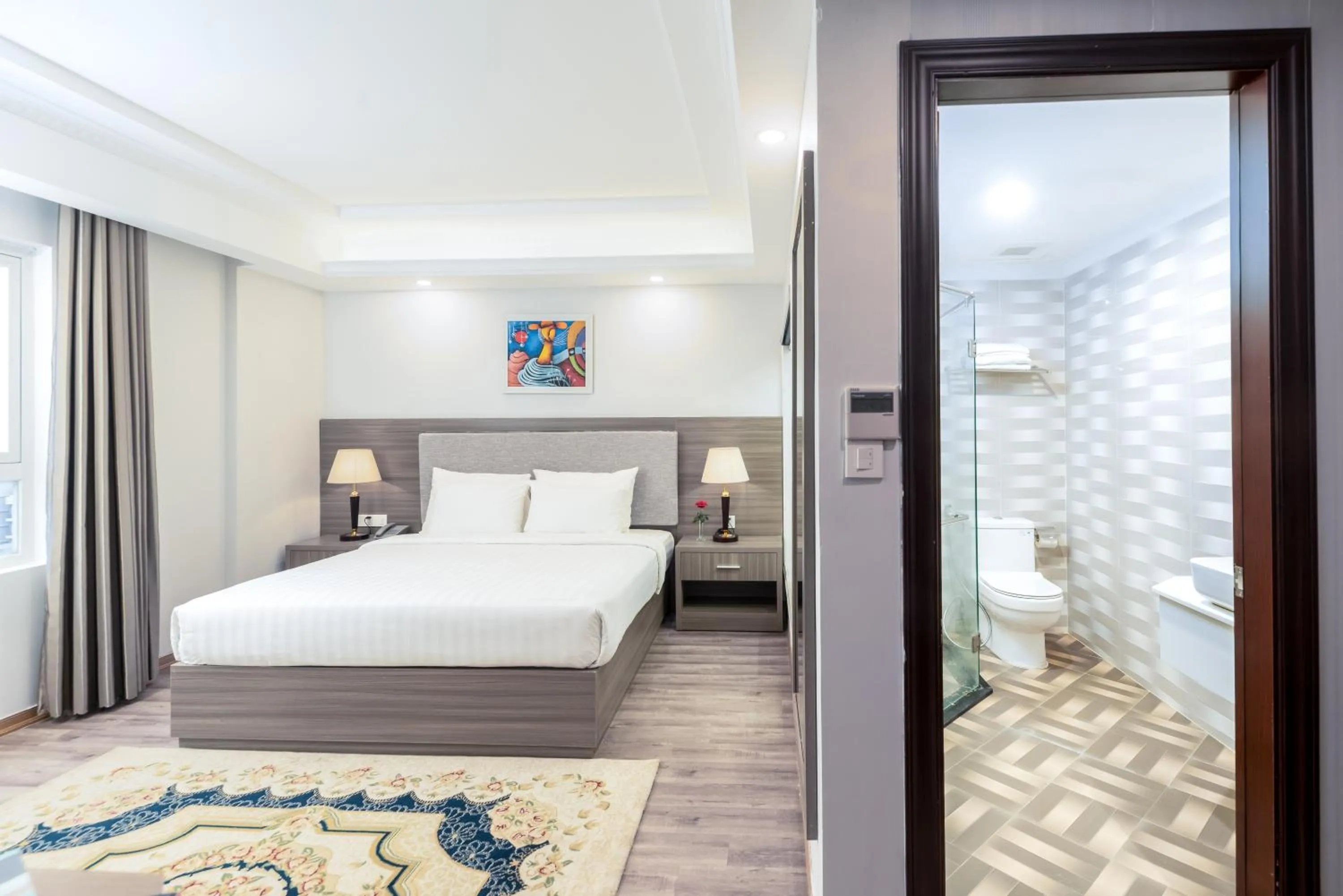 Bed in Golden Rose Hotel