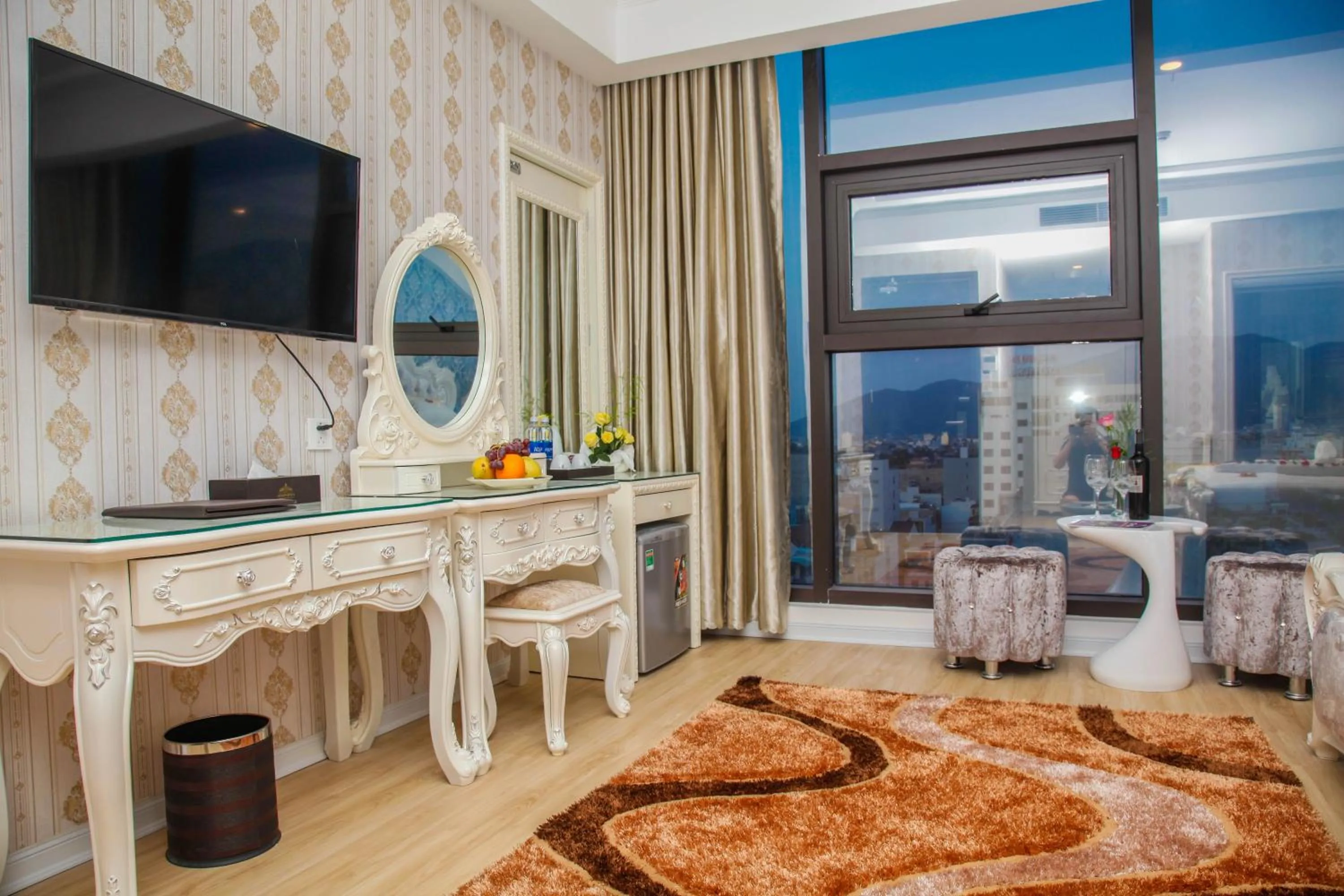 Communal lounge/ TV room in Golden Rose Hotel