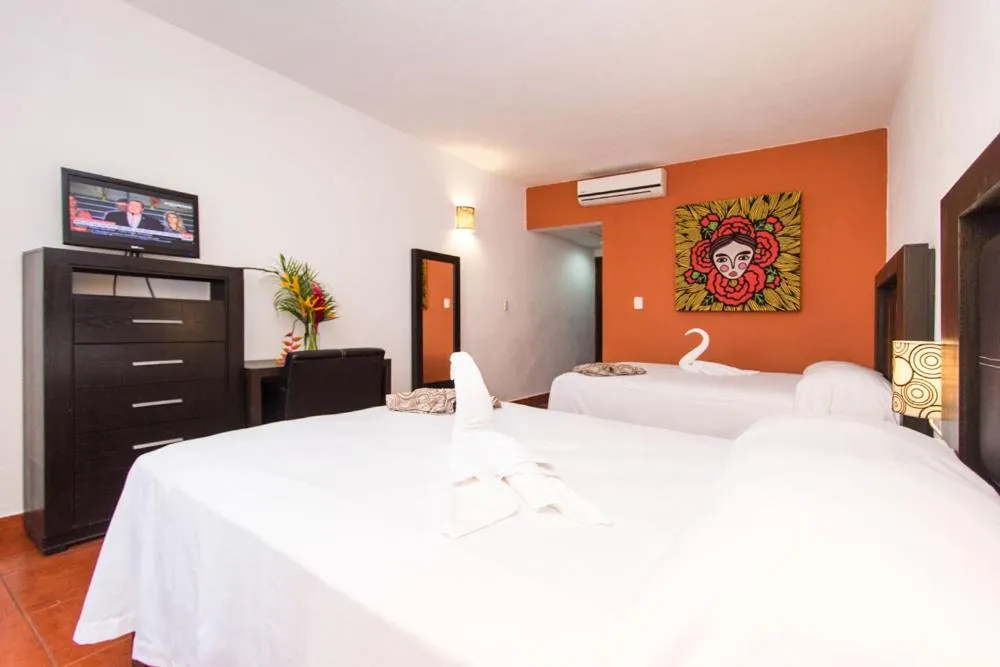 Bed in Hotel Santa Cruz Huatulco