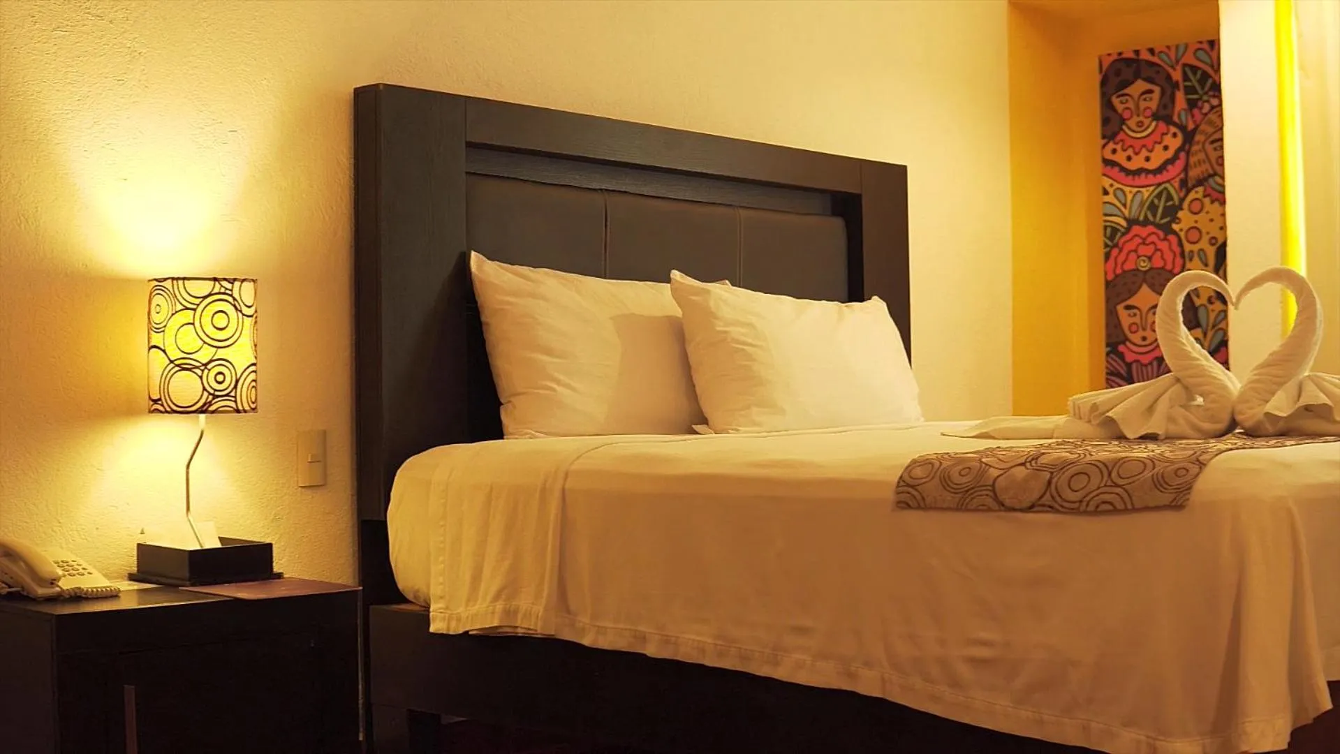 Bed in Hotel Santa Cruz Huatulco