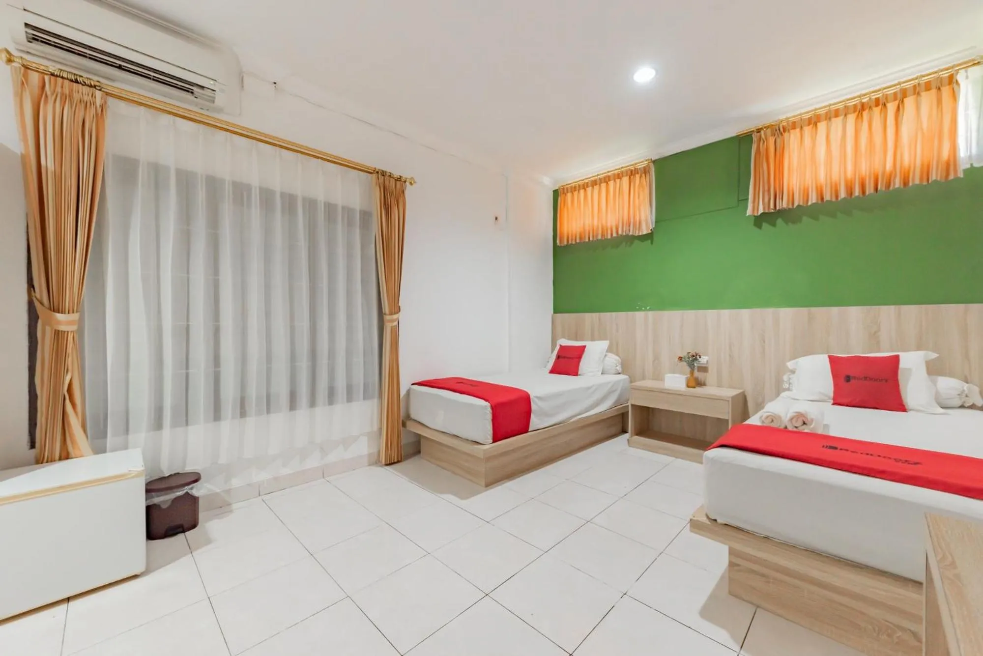 Bed in RedDoorz Syariah near Taman Bekapai 2