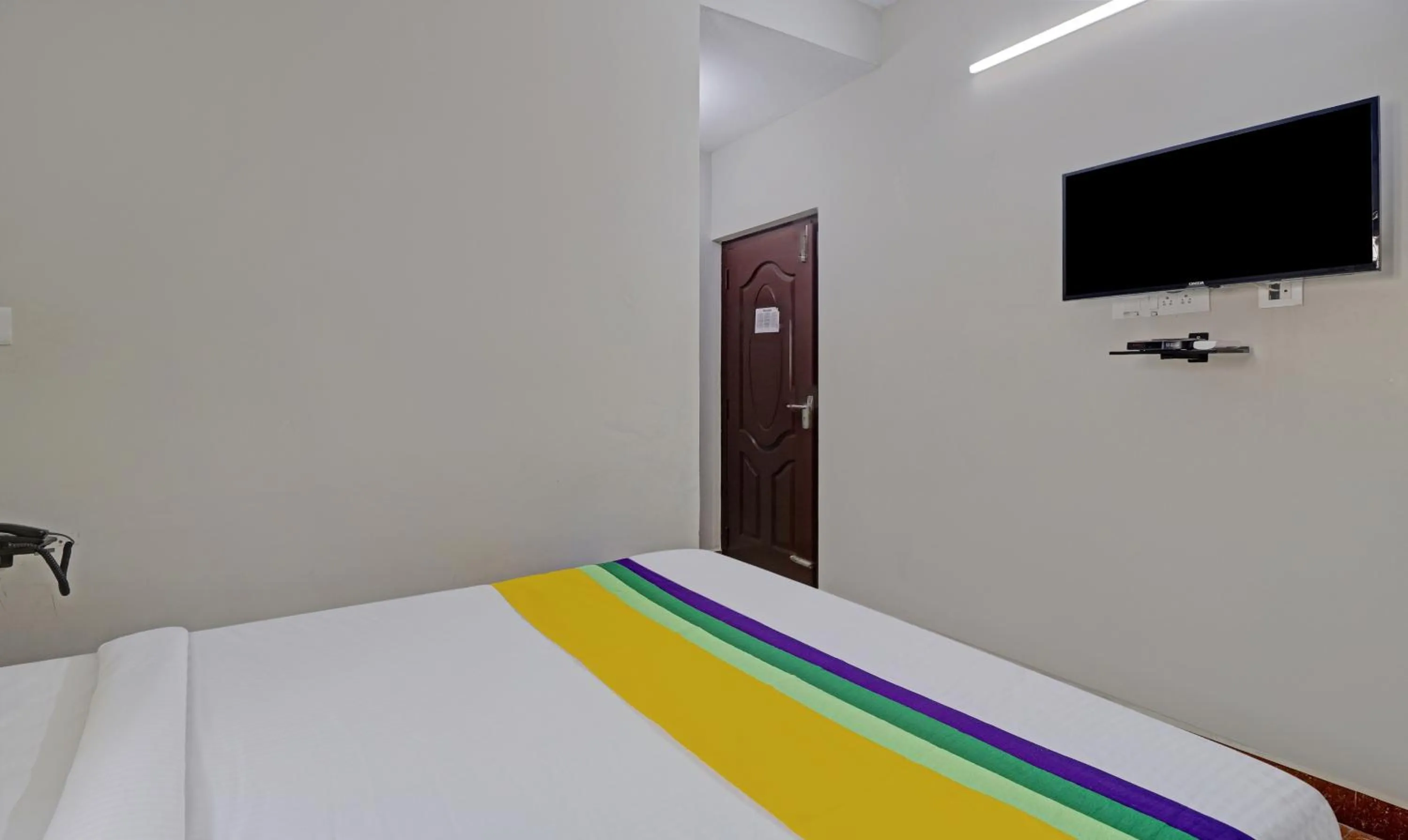 Bedroom, Bed in Itsy Hotels Rithika Inn Blossoms