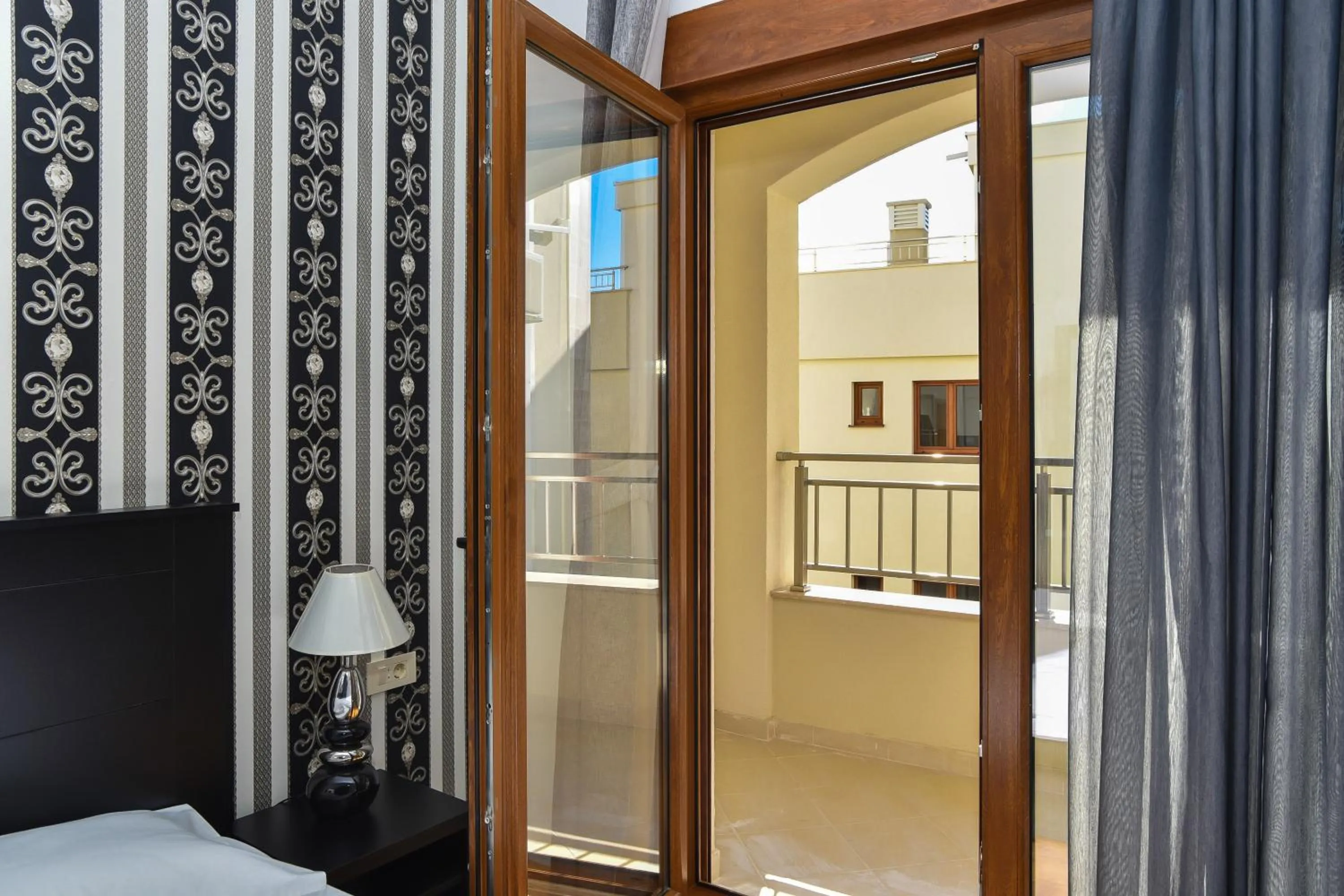 Bed in Vistamar Hotel & Apartments