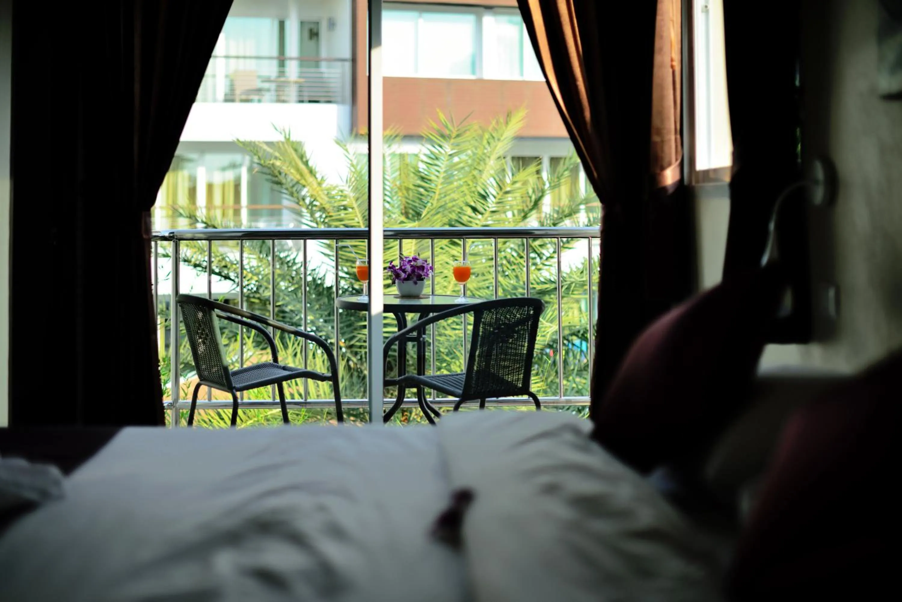 Bed in At Kamala Hotel