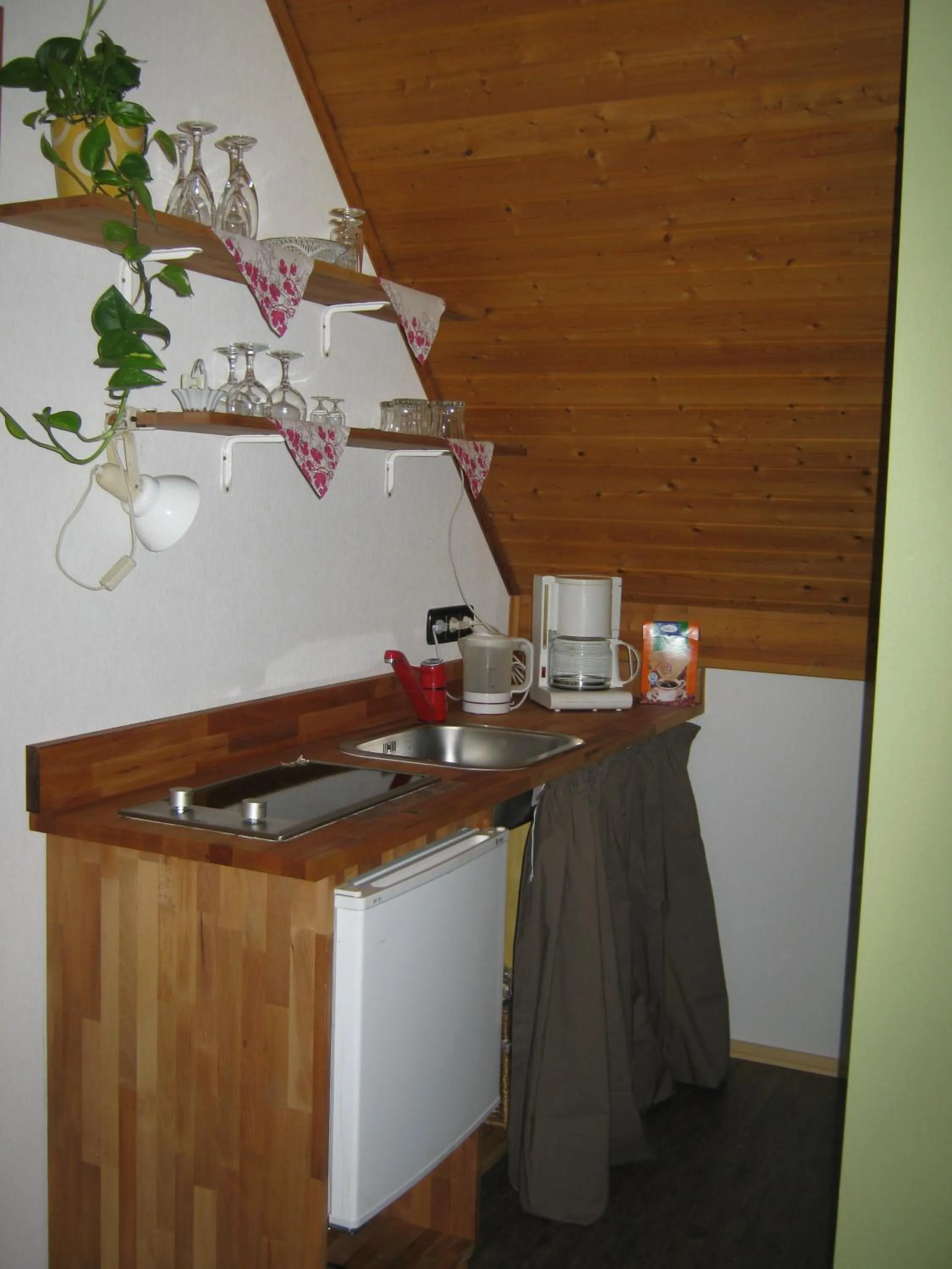 Kitchen or kitchenette in Stierstall-Suite Pension Wahlenau