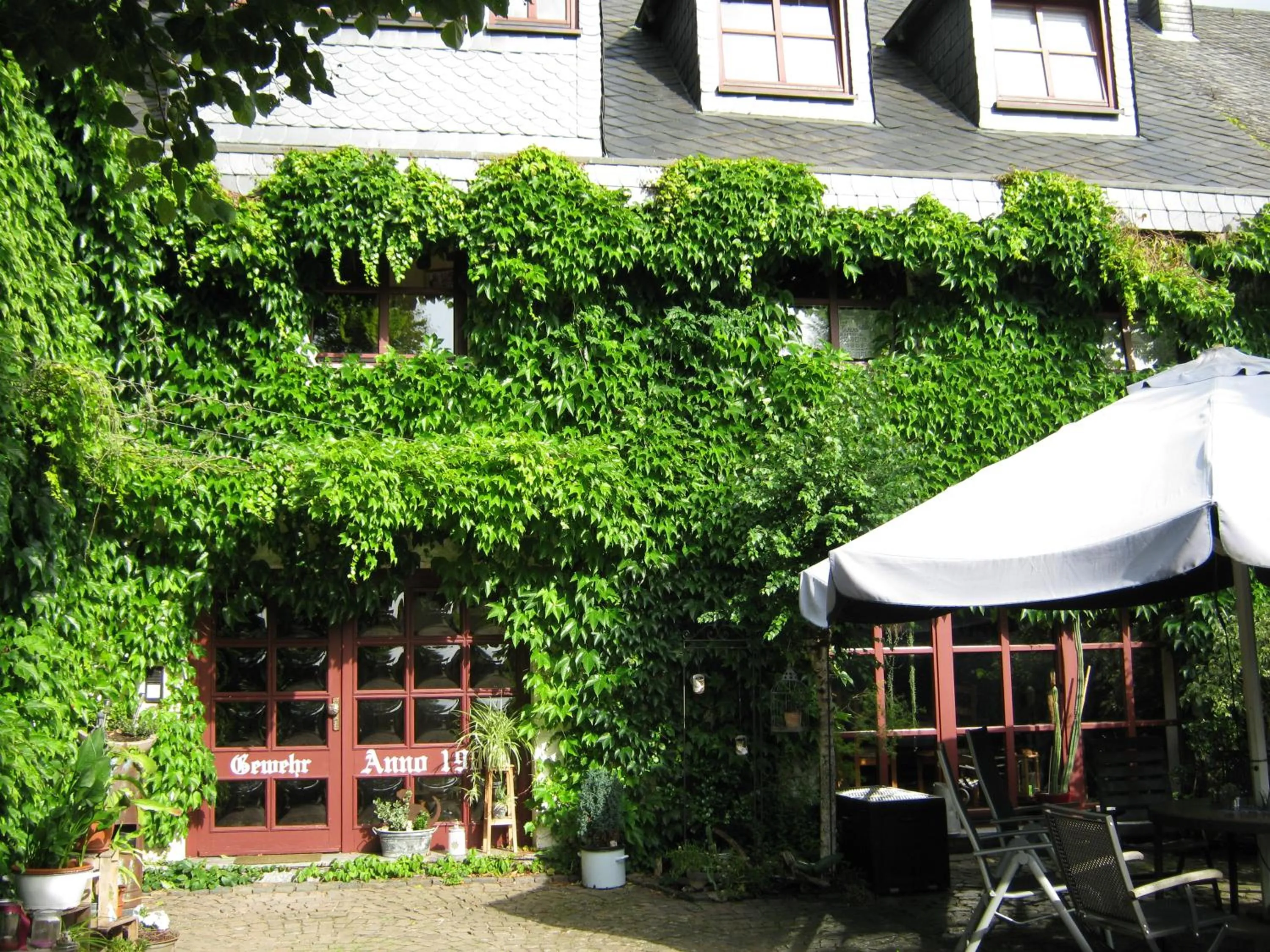 Facade/entrance in Stierstall-Suite Pension Wahlenau