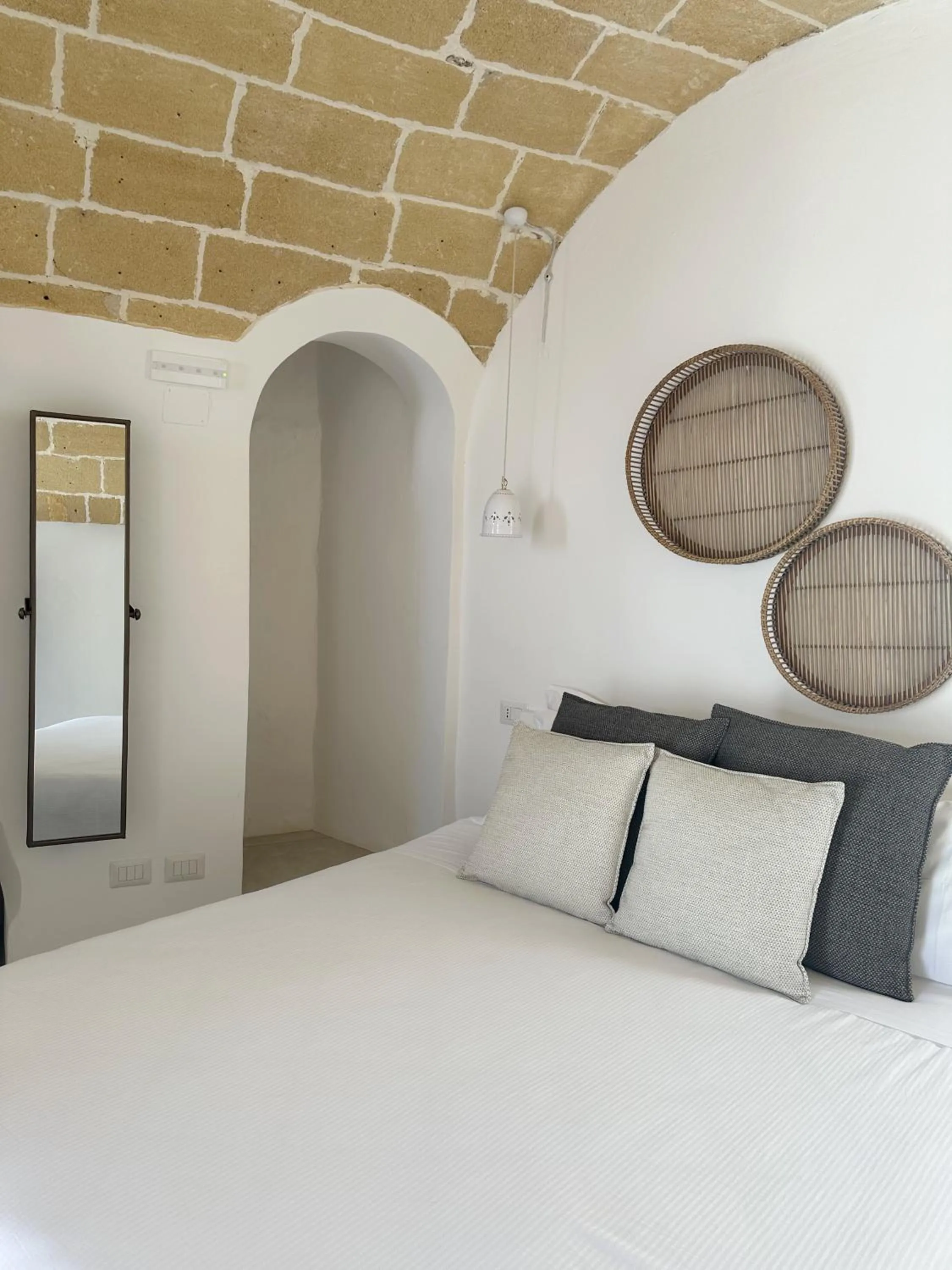 Bed in Palmieri Luxury Rooms