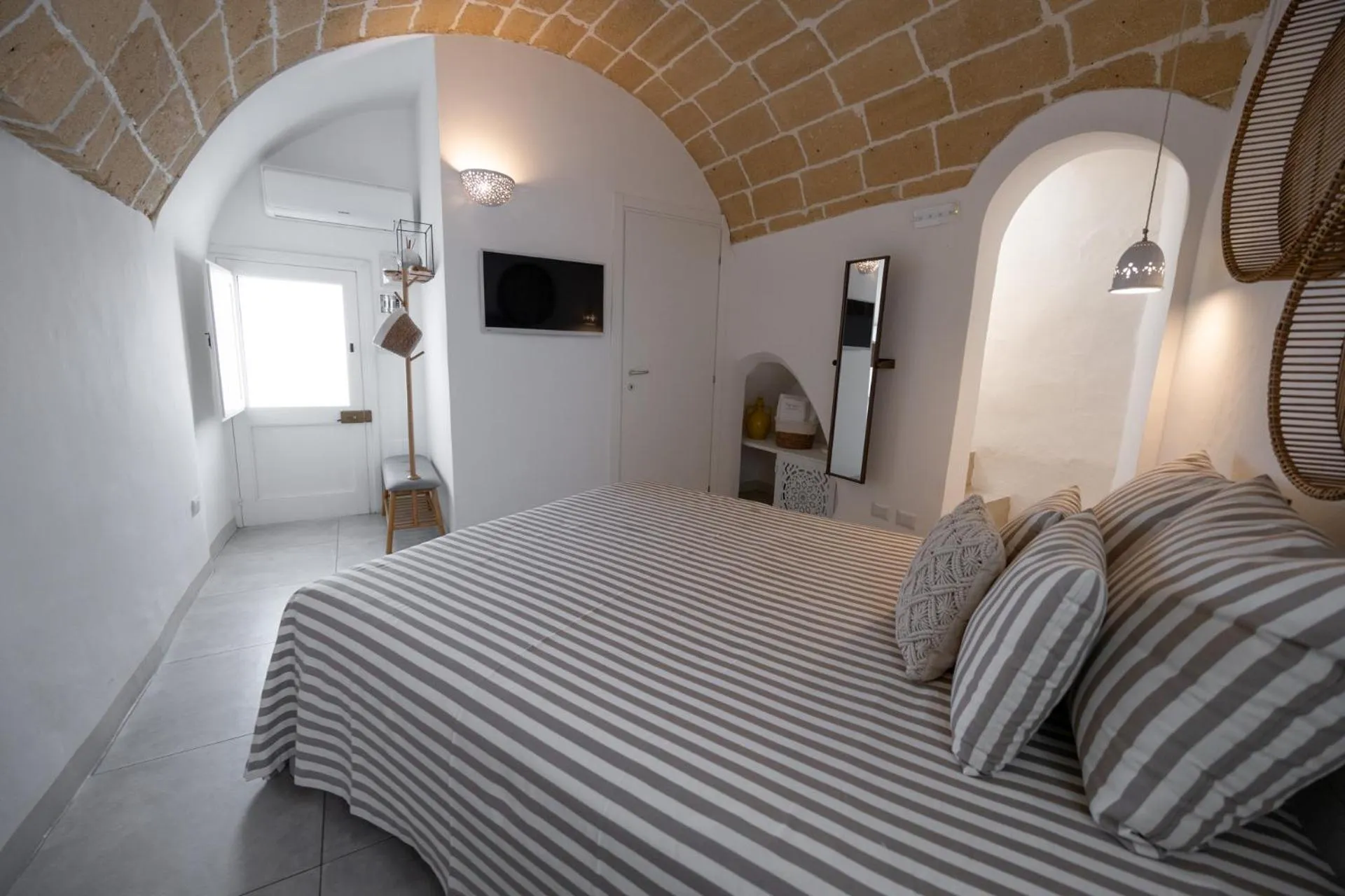 Bed in Palmieri Luxury Rooms