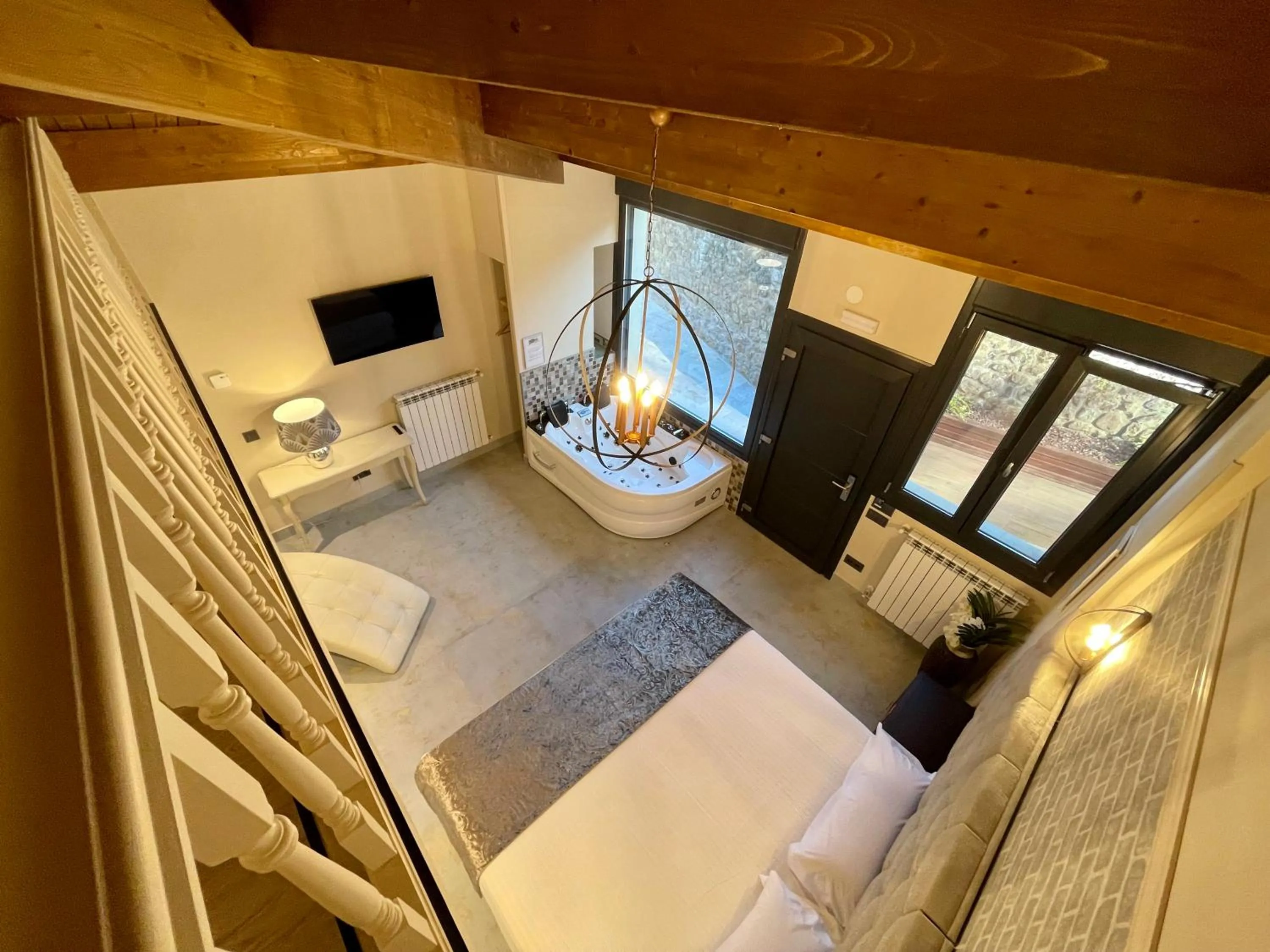 Photo of the whole room, Bed in Akla Hotel Suites Valles Pasiegos