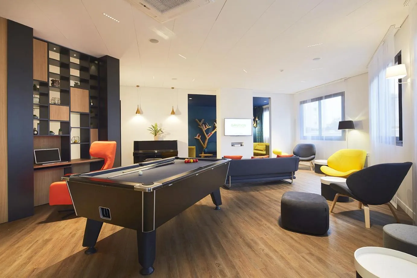 Communal lounge/ TV room in Kyriad Paris Ouest - Bezons La Défense