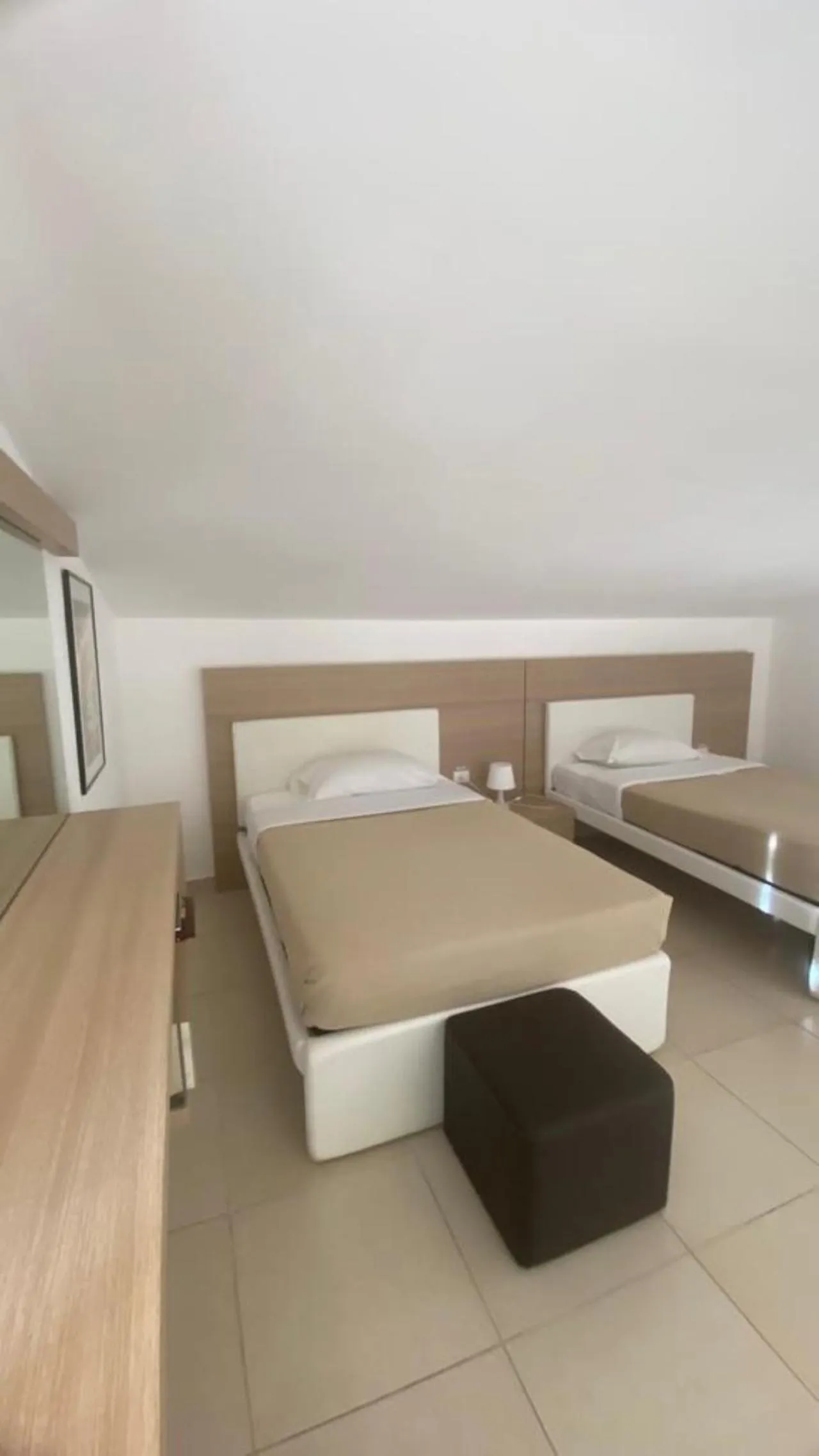 Bed in San Michele Apartments&Rooms