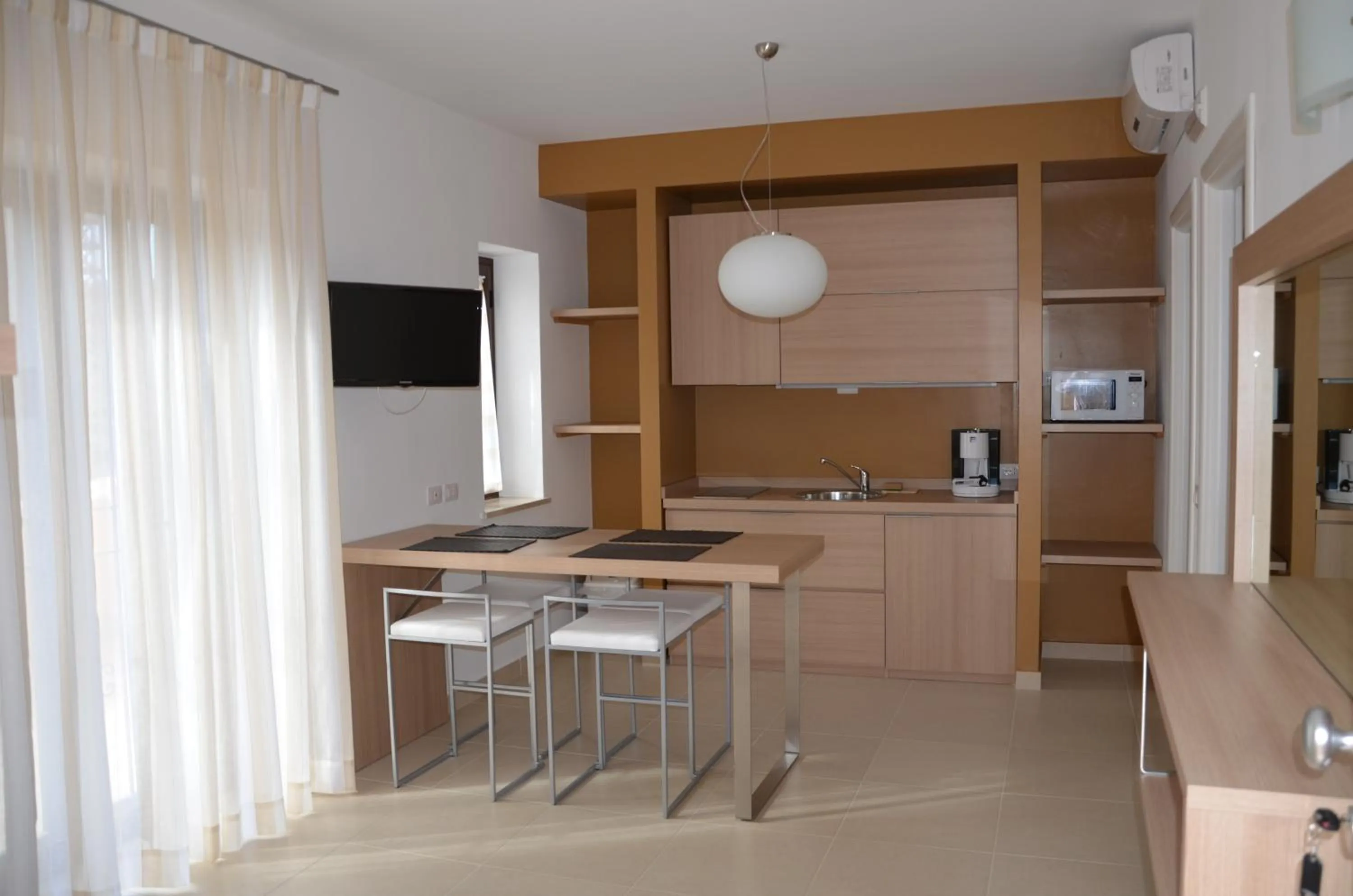 Kitchen or kitchenette in San Michele Apartments&Rooms