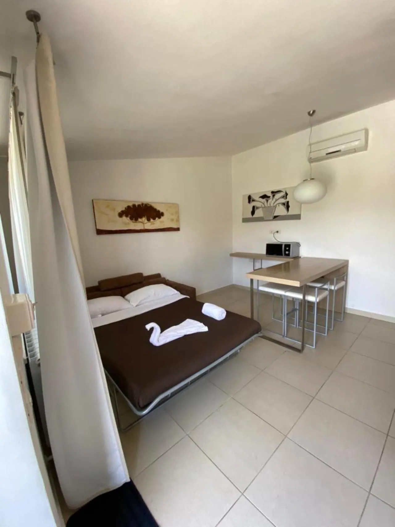 Bed in San Michele Apartments&Rooms