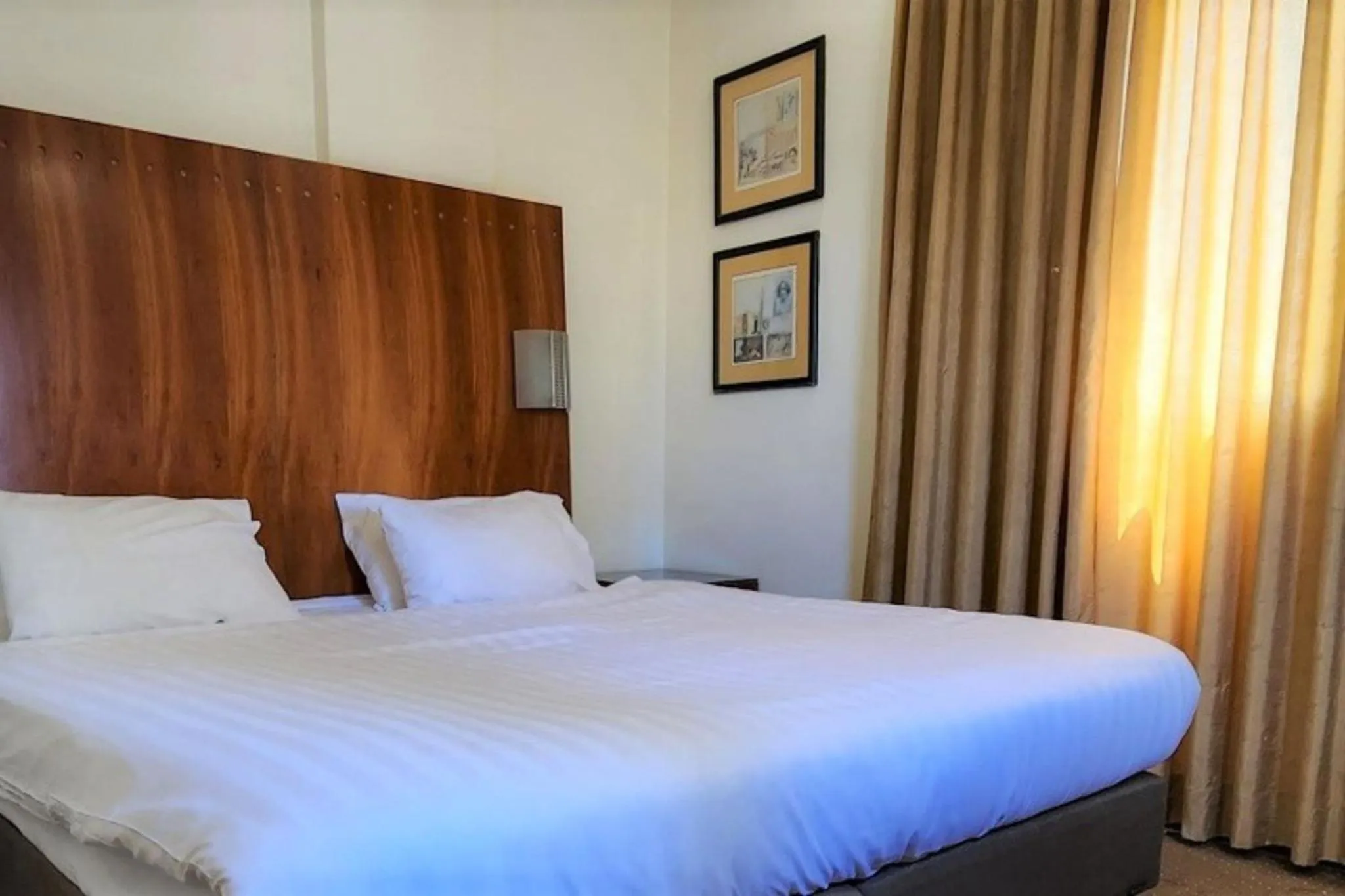 Bed in SeaNet Hotel By AFI Hotels