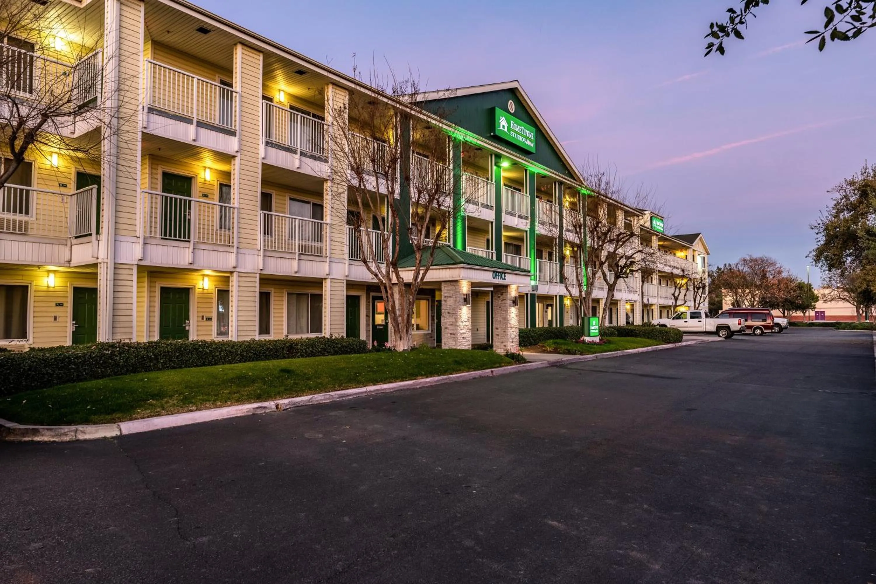 Property building in HomeTowne Studios by Red Roof Fresno - West