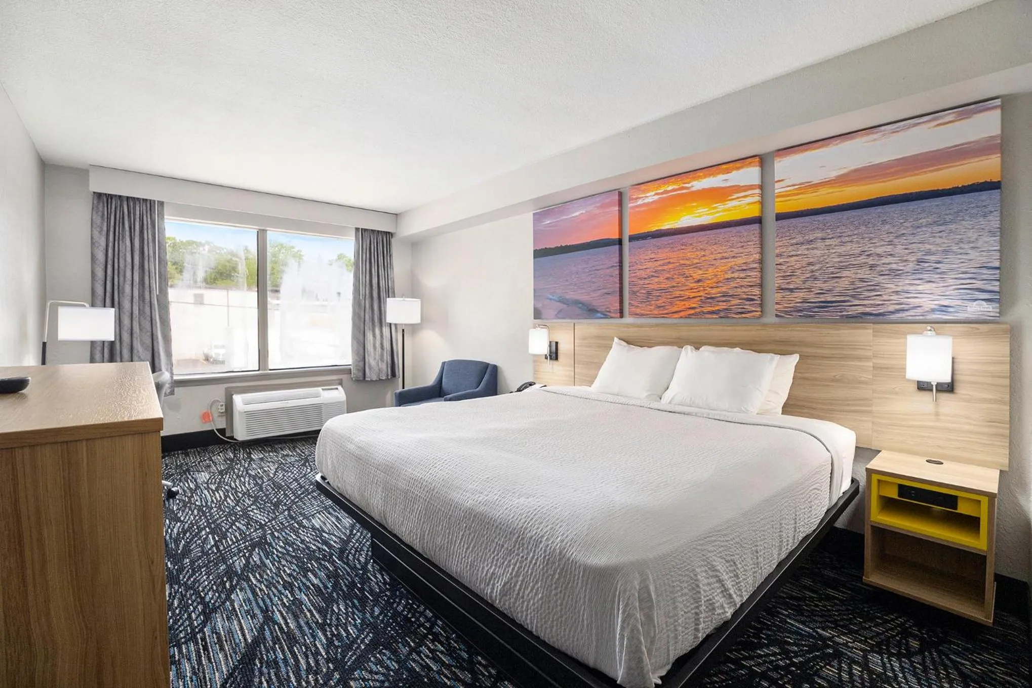 Bed in Days Inn & Suites by Wyndham Norton Shores Muskegon