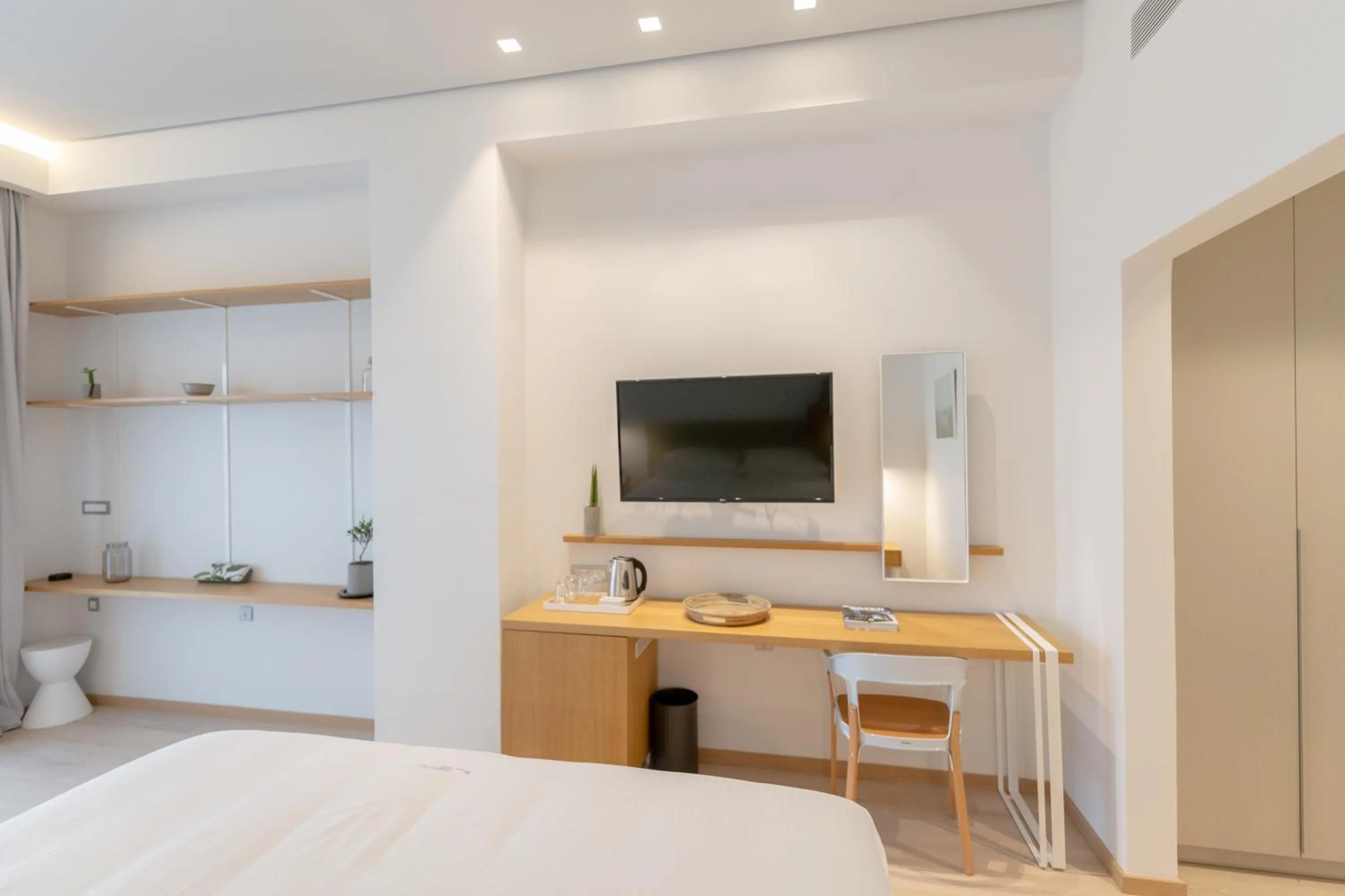 Bedroom in Messinian Icon Hotel & Suites